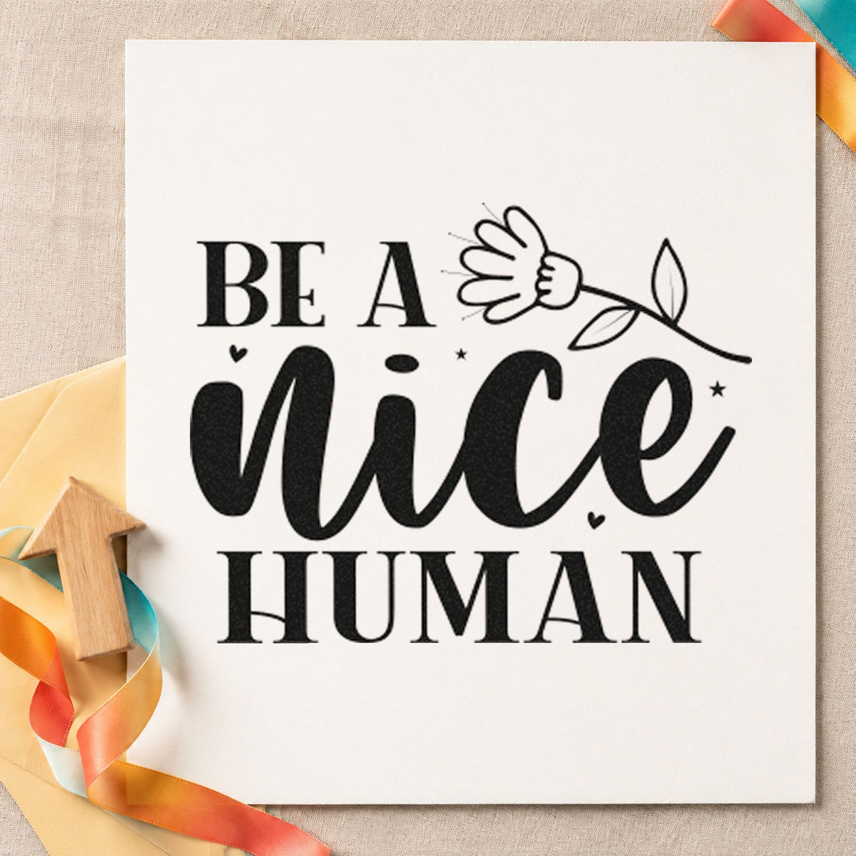 Be A Nice Human Flower craft stamp in black ink on cardstock, an easy option for lending album page.