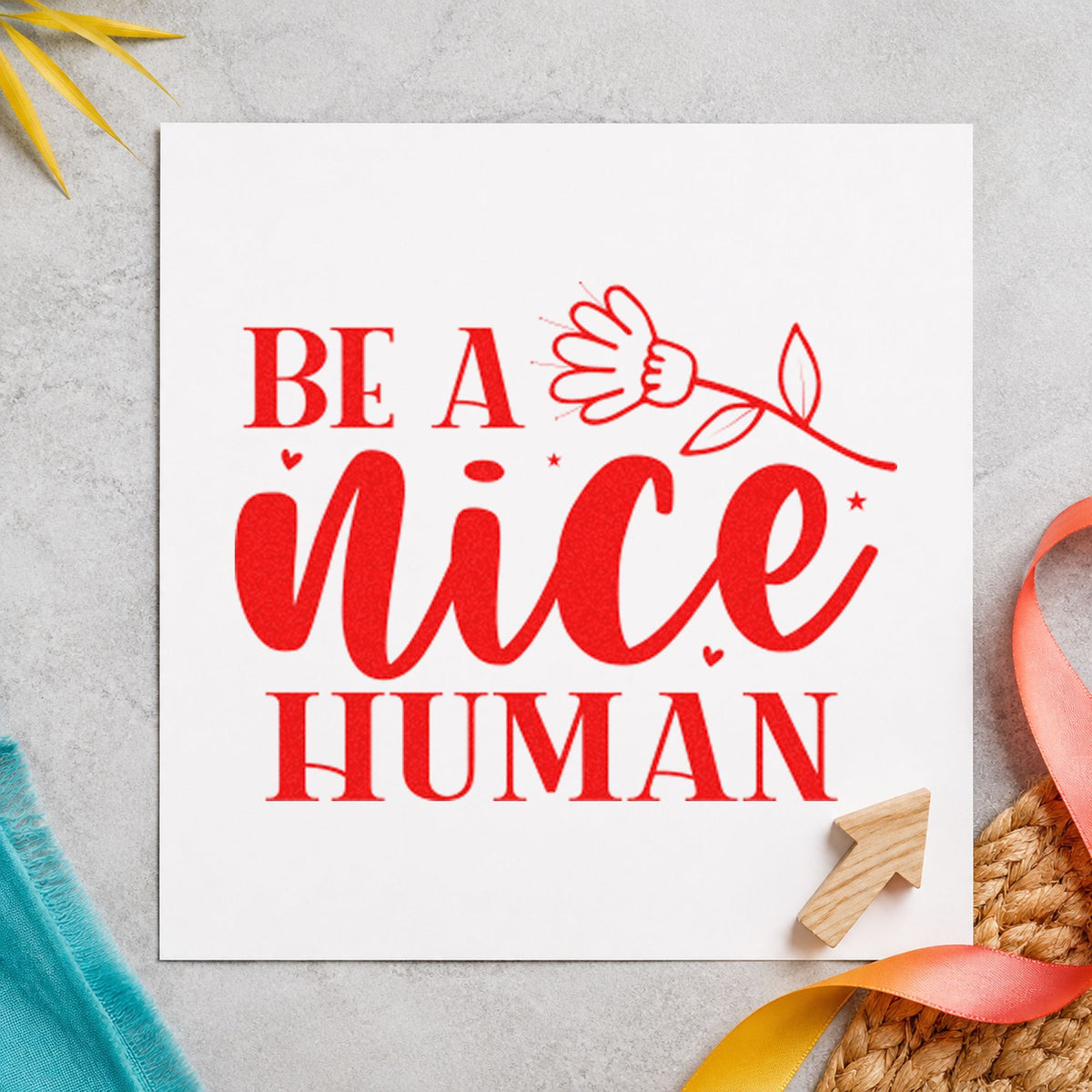 Be A Nice Human Flower craft stamp imprint in red ink on a handmade project, one idea being use tip cards.