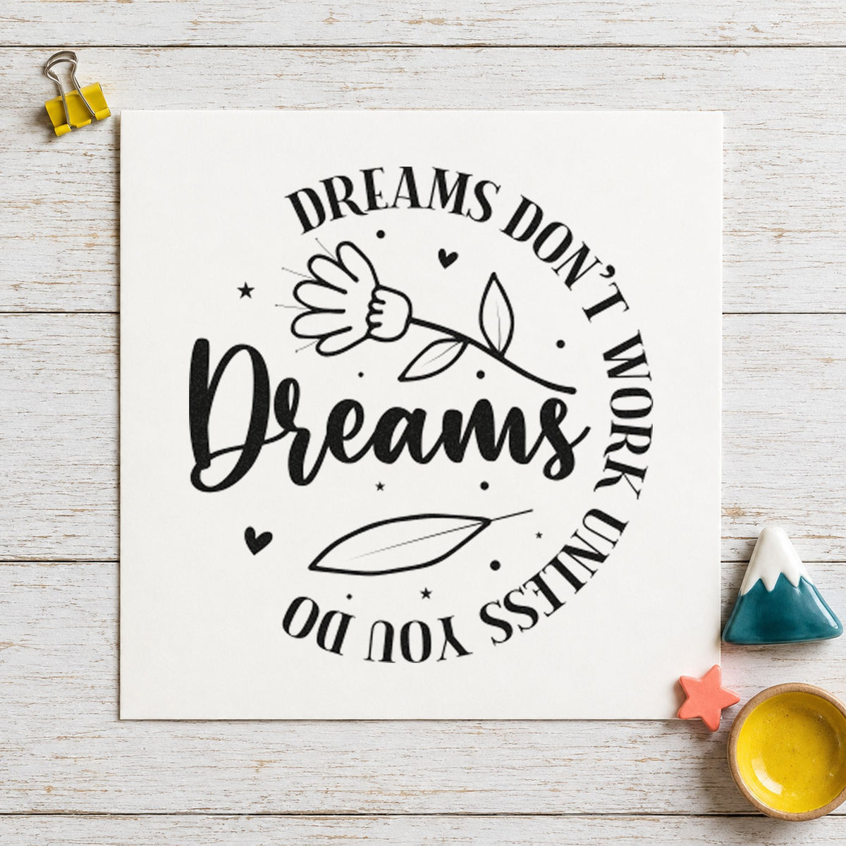 Dreams Don't Work Floral Circle craft stamp imprint in black ink on a handmade project, one idea being music book gift tags.