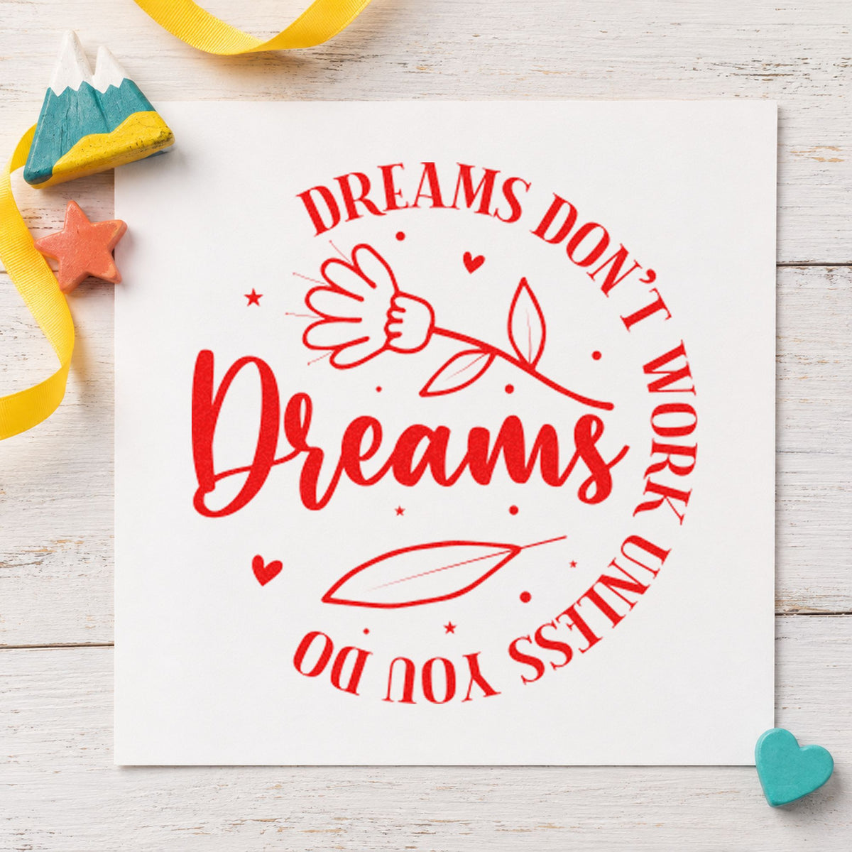 Dreams Don't Work Floral Circle craft stamp imprint in red ink on a handmade project, one idea being practice goal cards.