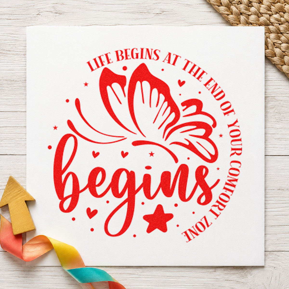 Life Begins Comfort Zone Butterfly craft stamp imprint in red ink on a handmade project, one idea being ride plan cards.