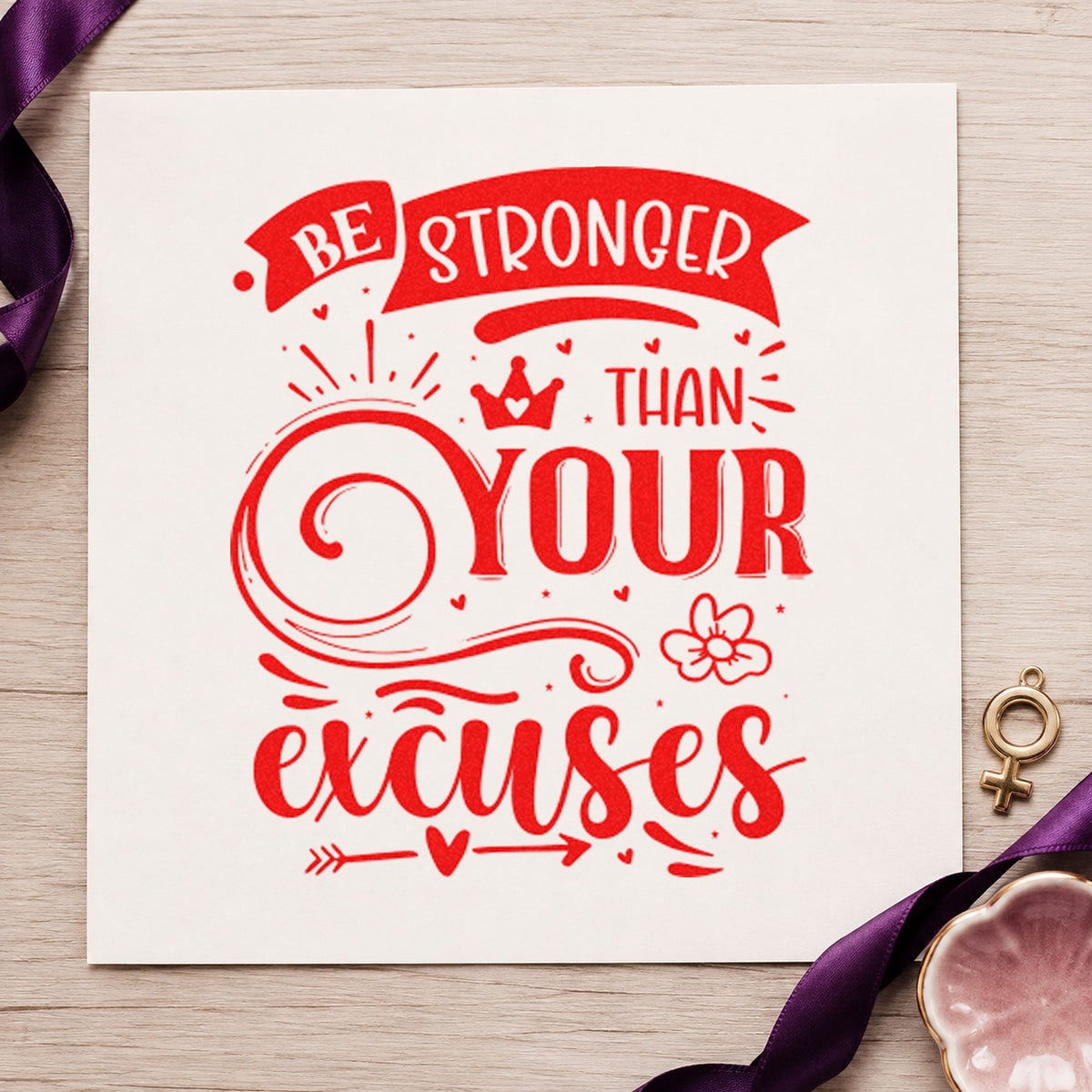 Stronger Than Your Excuses Crown craft stamp imprint in red ink on a handmade project, one idea being course walk cards.