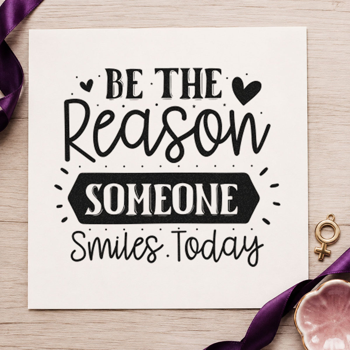 Be Reason Someone Smiles Today craft stamp imprint in black ink on a handmade project, one idea being gift wrap tags.