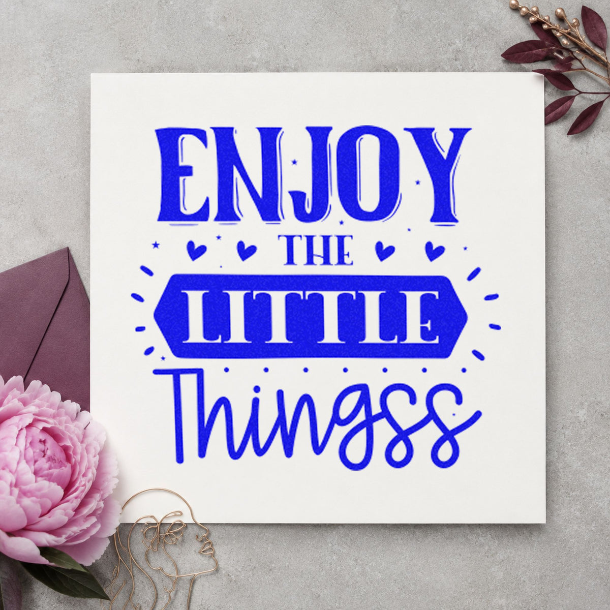 Enjoy The Little Things Hearts craft stamp imprinted in blue ink on paper, a design suited to framed kitchen door.
