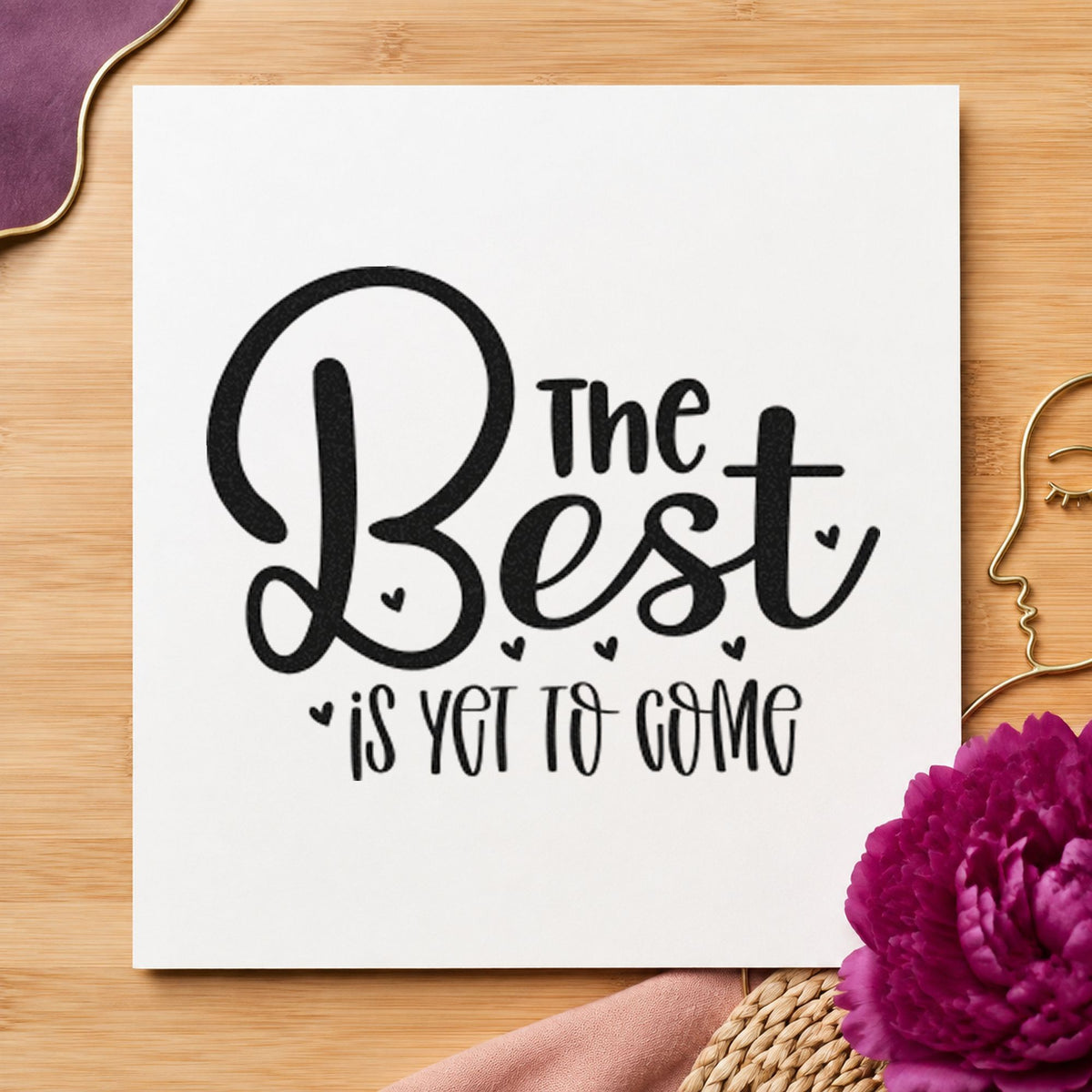 The Best Is Yet To Come craft stamp imprint in black ink on a handmade project, one idea being party favor tags.