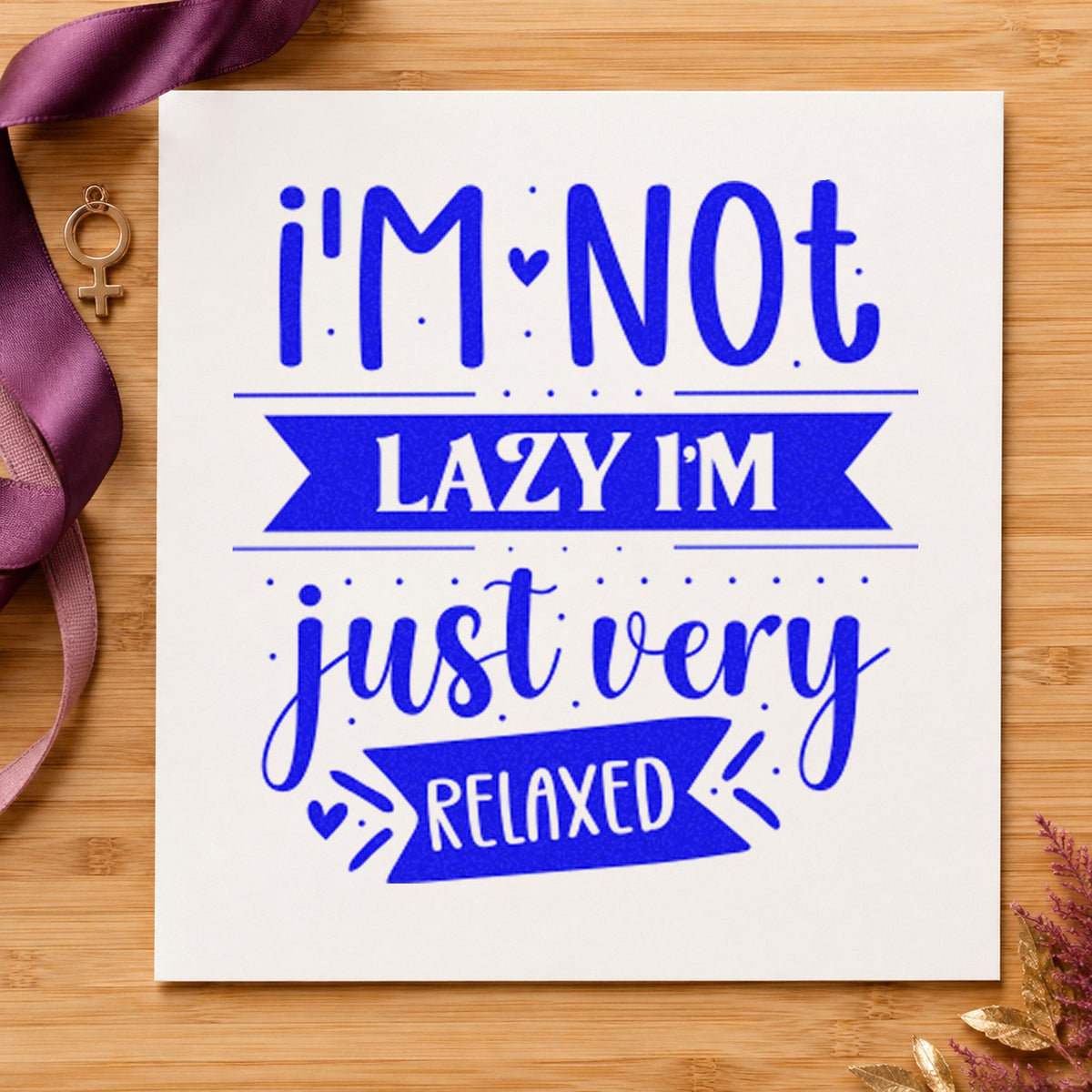 Not Lazy Just Very Relaxed craft stamp in blue ink on cardstock, an easy option for throw corner printing.