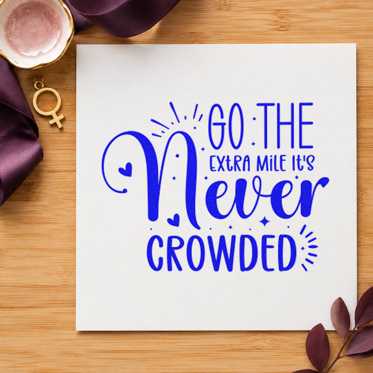 Go Extra Mile Never Crowded craft stamp in blue ink on cardstock, an easy option for furniture pad printing.
