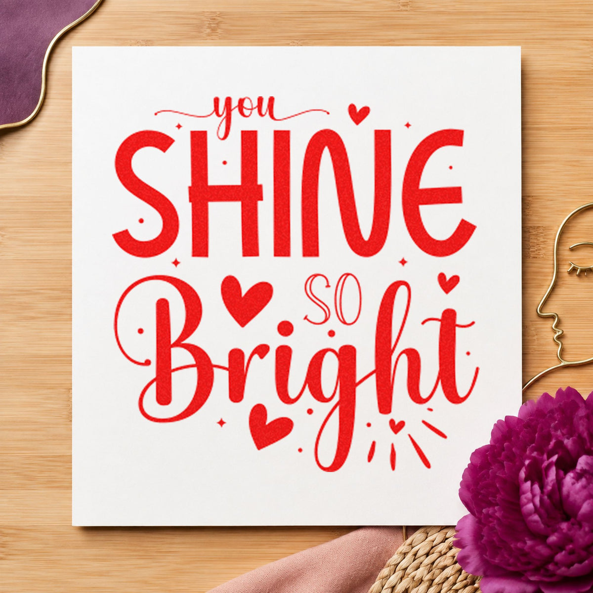 You Shine So Bright craft stamp imprint in red ink on a handmade project, one idea being group photo cards.