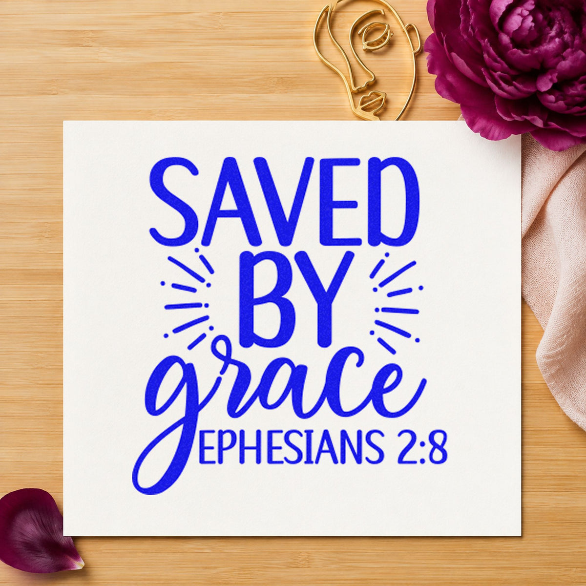 Saved By Grace Ephesians craft stamp imprinted in blue ink on paper, a design suited to framed foyer wall.