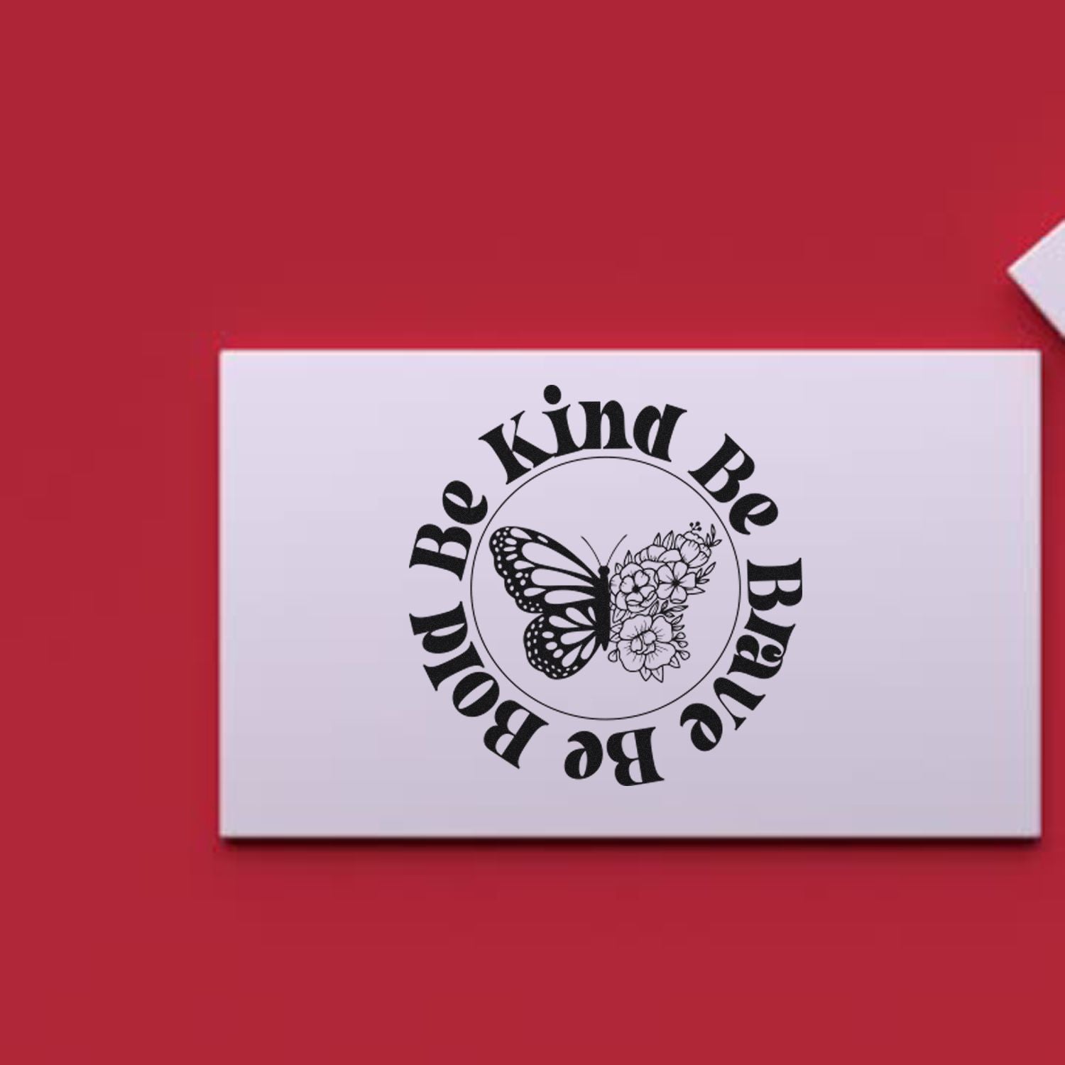 Custom rubber stamp design with butterfly and flowers reading "Be Kind Be Brave Be Bold" for motivational crafts and packaging.