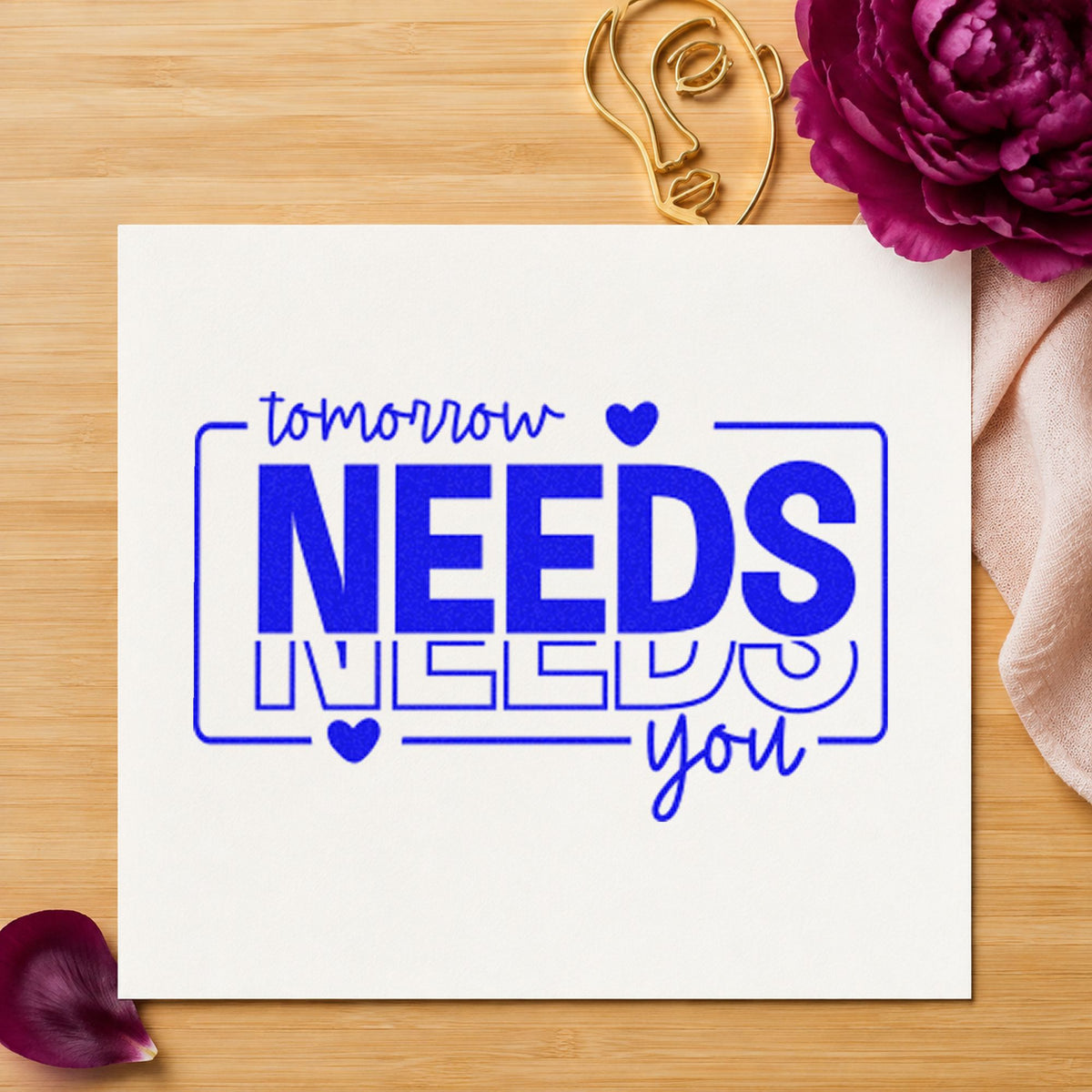 Tomorrow Needs You Repeated craft stamp imprinted in blue ink on paper, a design suited to framed hall entry.
