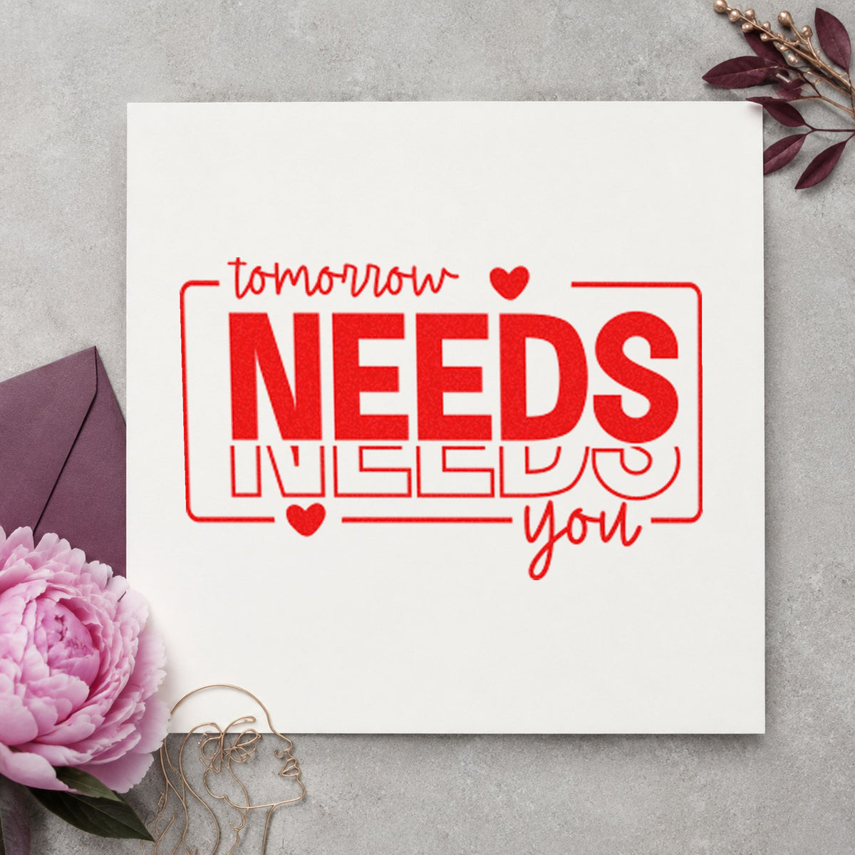 Tomorrow Needs You Repeated craft stamp imprint in red ink on a handmade project, one idea being thank donor cards.