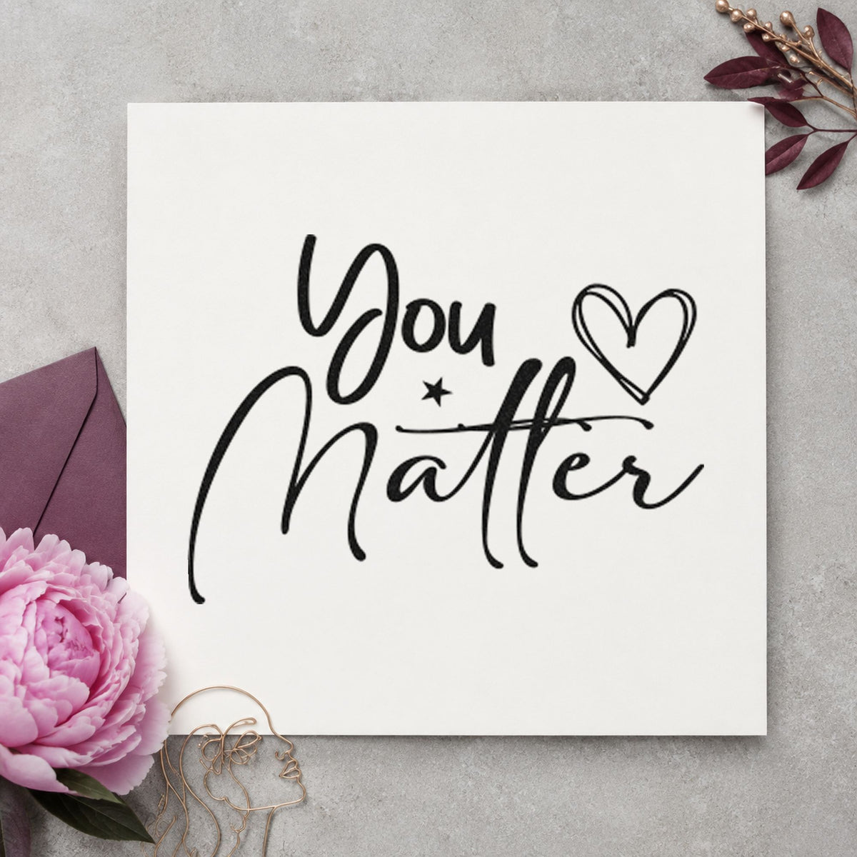 You Matter Heart Star craft stamp imprint in black ink on a handmade project, one idea being outing gift tags.