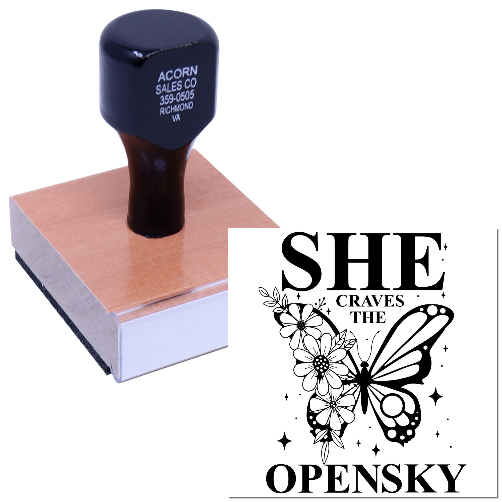 Custom rubber stamp with butterfly floral quote design, stamping She Craves the Open Sky for crafts and branding.
