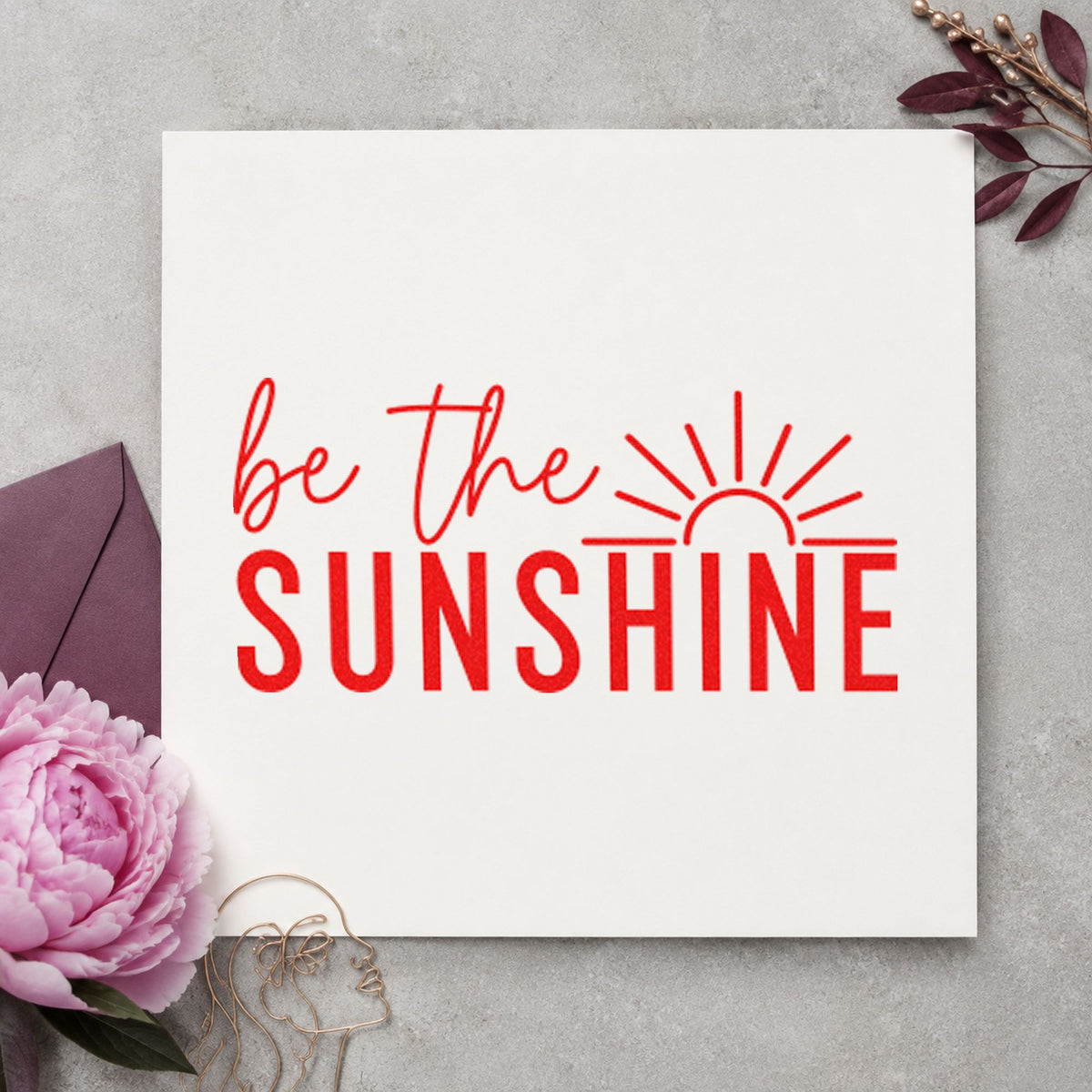 Be The Sunshine Sunrise craft stamp imprint in red ink on a handmade project, one idea being cleanup tally cards.