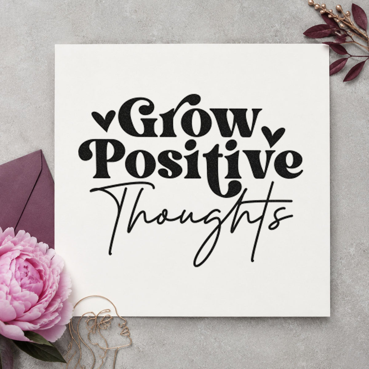 Grow Positive Thoughts Hearts craft stamp imprint in black ink on a handmade project, one idea being surplus gift tags.