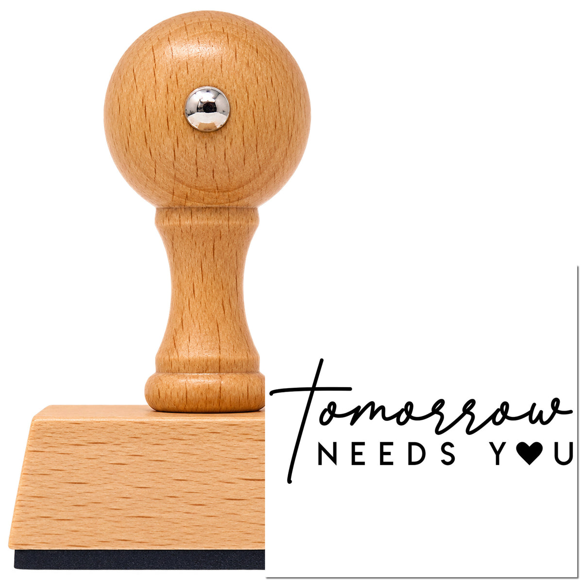 Tomorrow Needs You Vintage Pro rubber stamp in European beech wood with a round knob handle, shown beside its black imprint.