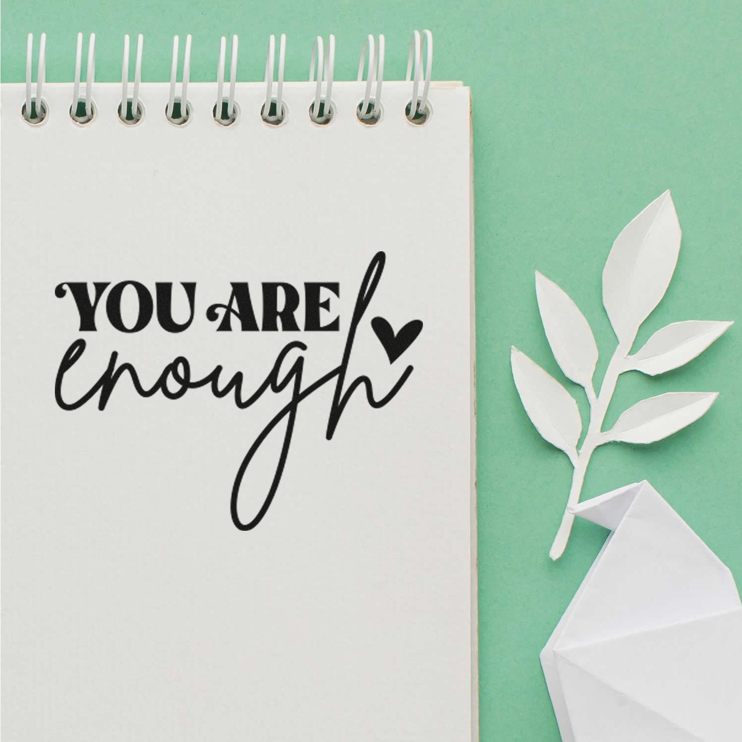 You Are Enough rubber stamp on notebook page, an inspirational sentiment for handmade cards, journaling, and paper crafts.