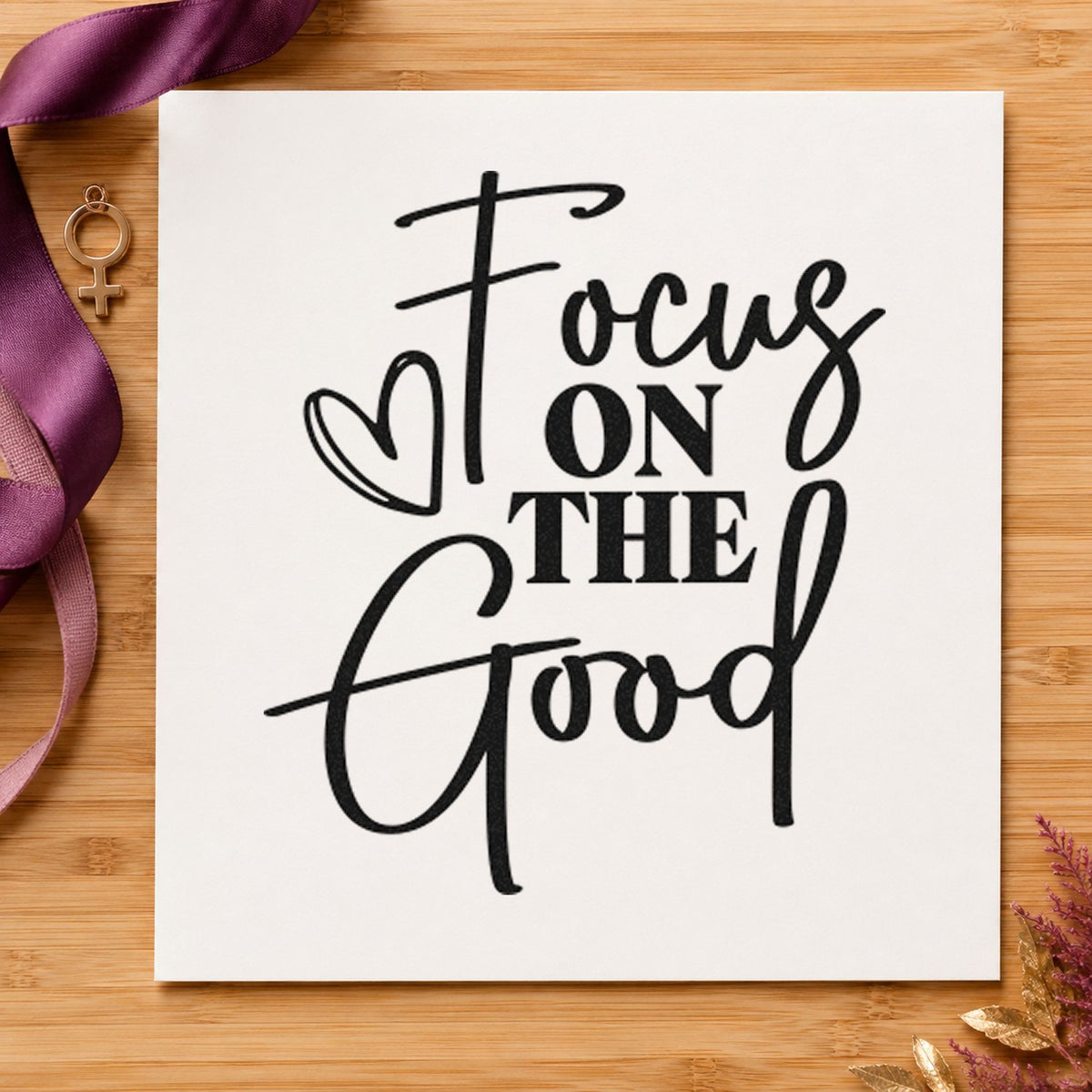 Focus On The Good craft stamp imprint in black ink on a handmade project, one idea being reading gift tags.