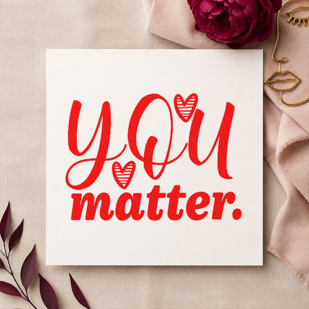 You Matter Striped Hearts rubber stamp shown in red ink, stamped for projects such as bin game labels.
