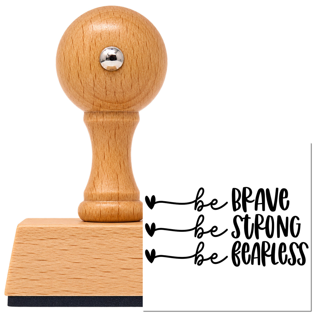 Brave Strong Fearless Hearts Vintage Pro rubber stamp in European beech wood with a round knob handle, shown beside its black imprint.
