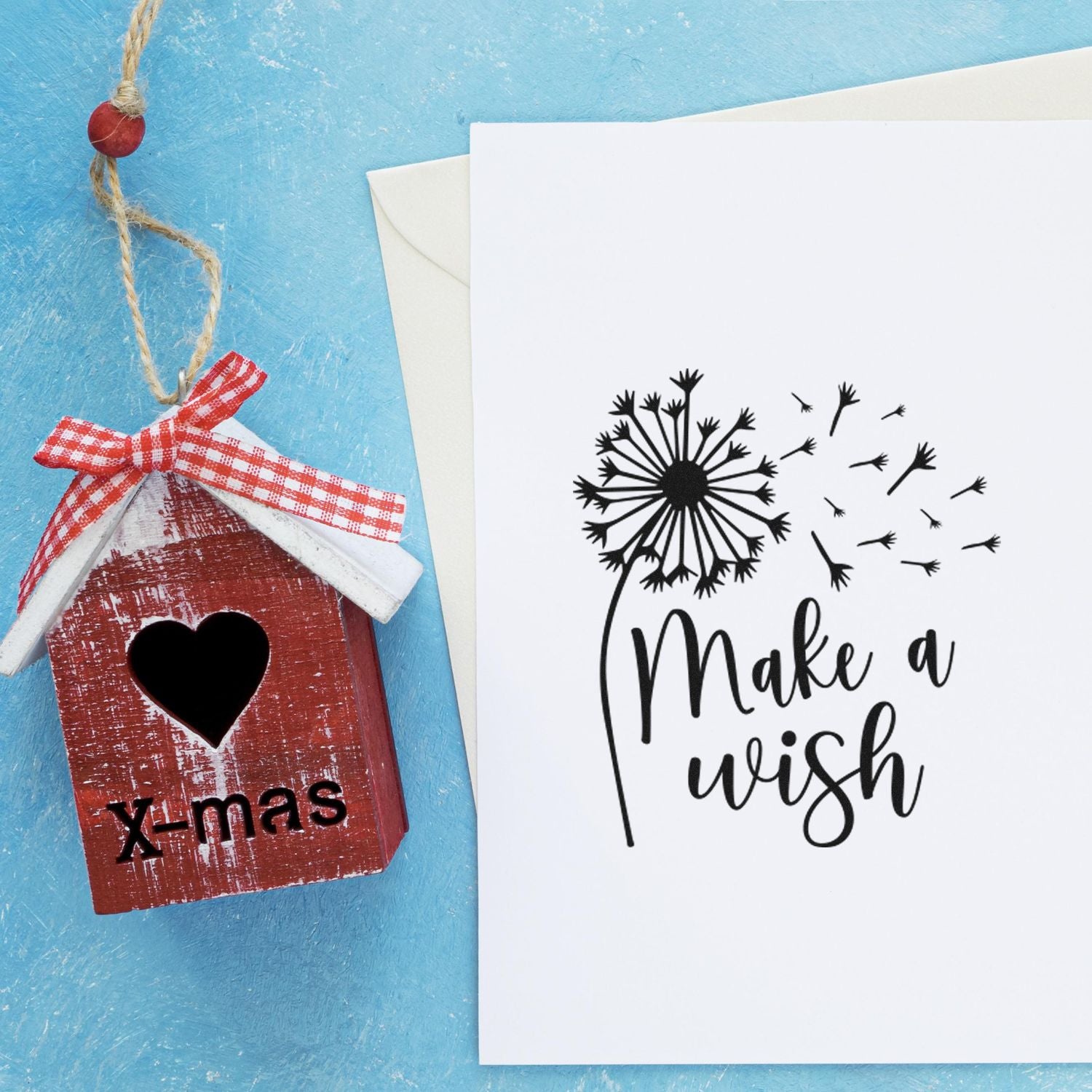 Holiday rubber stamp samples on handmade card and birdhouse ornament with dandelion Make a wish and x-mas designs.