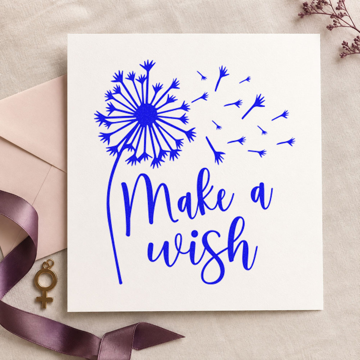 Make A Wish Dandelion craft stamp in blue ink on cardstock, an easy option for beach towel printing.