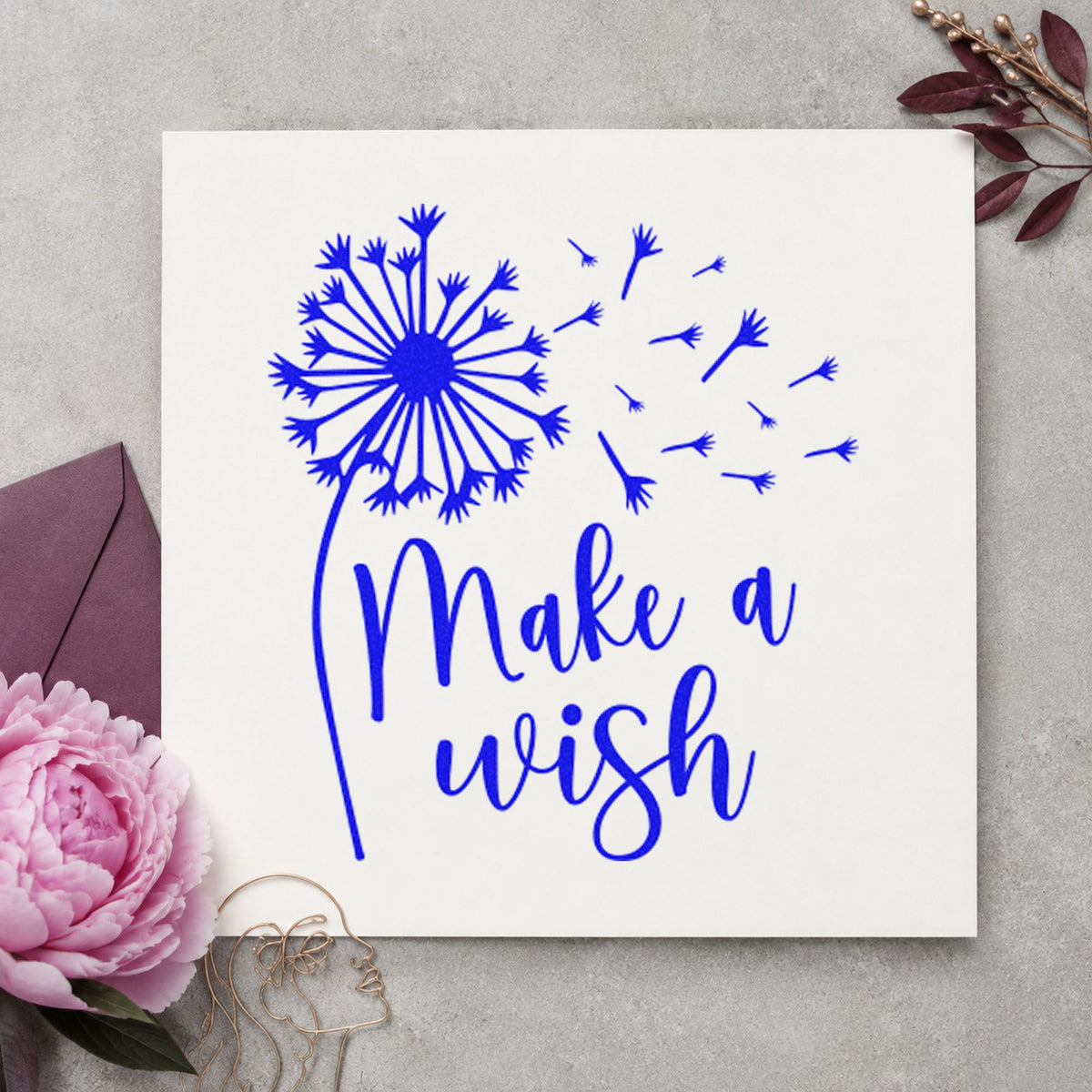 Make A Wish Dandelion craft stamp imprinted in blue ink on paper, a design suited to framed back door.