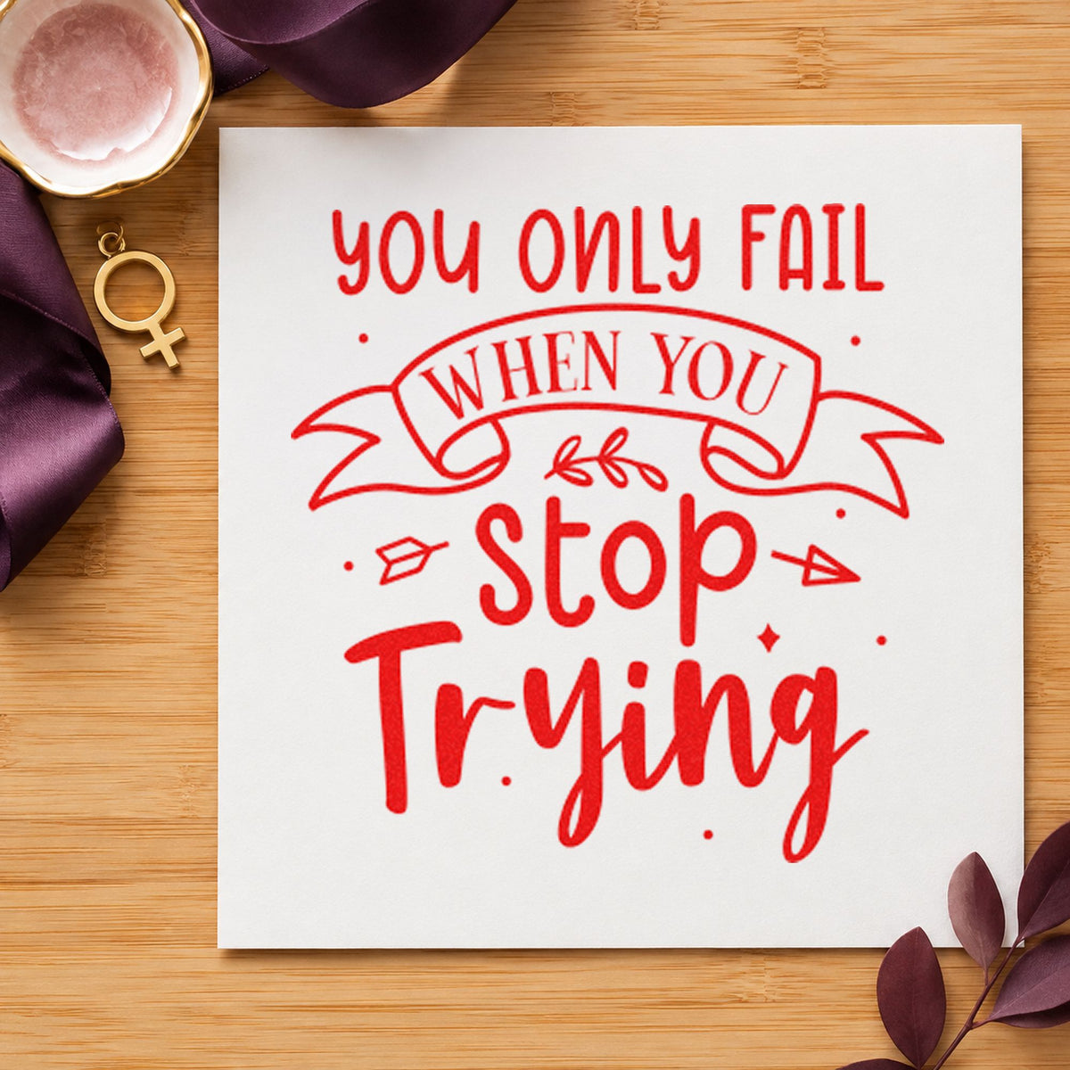 Only Fail Stop Trying craft stamp imprint in red ink on a handmade project, one idea being match note cards.
