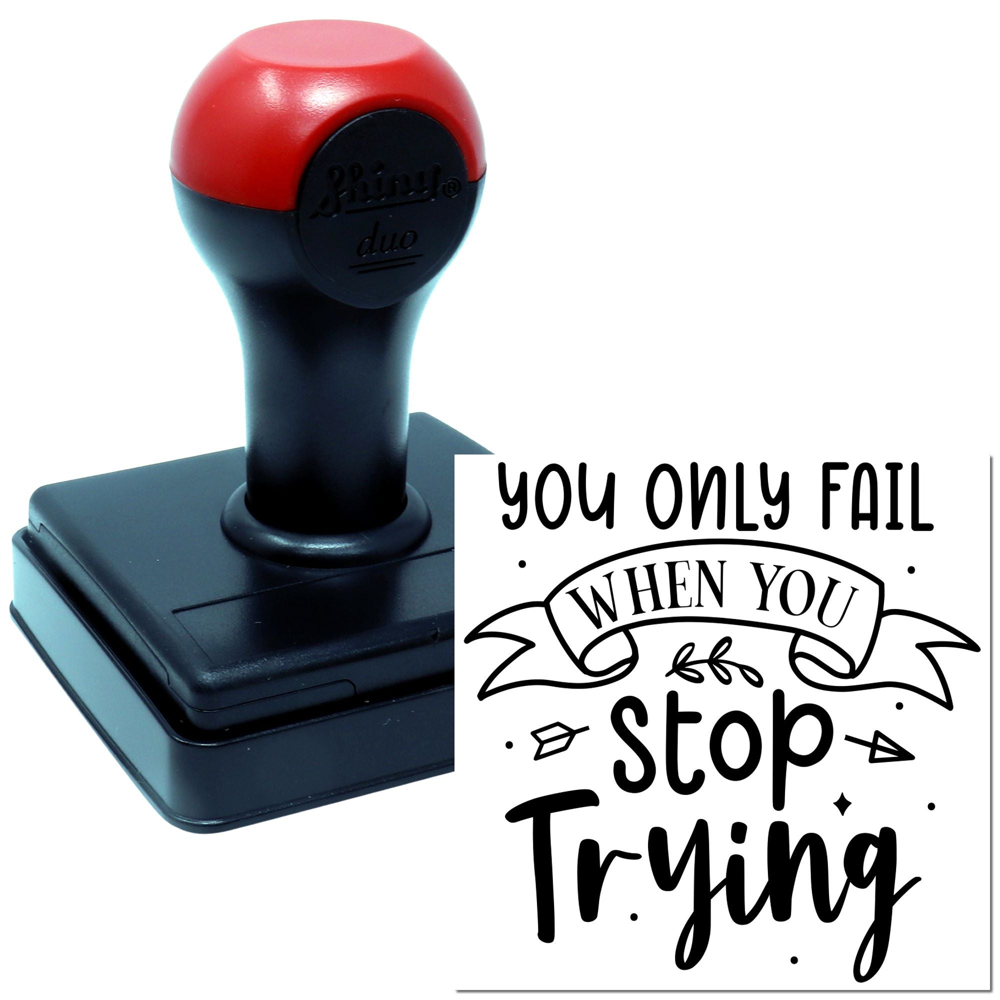Self-inking rubber stamp with motivational You only fail when you stop trying message for office or classroom use.