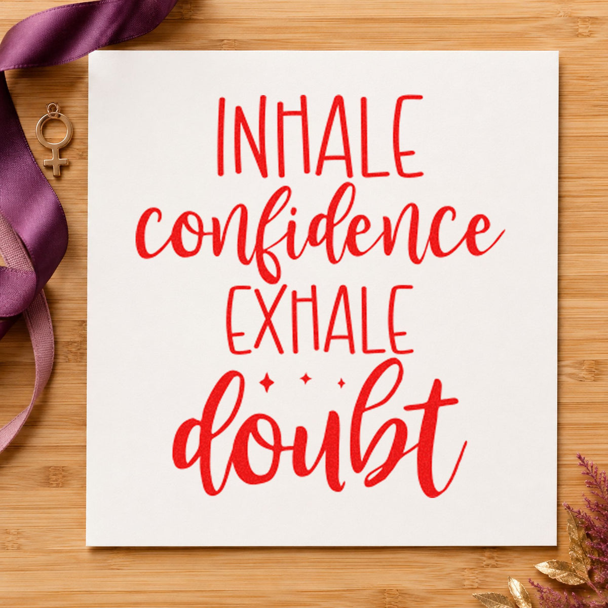 Inhale Confidence Exhale Doubt craft stamp imprint in red ink on a handmade project, one idea being checkout chart cards.