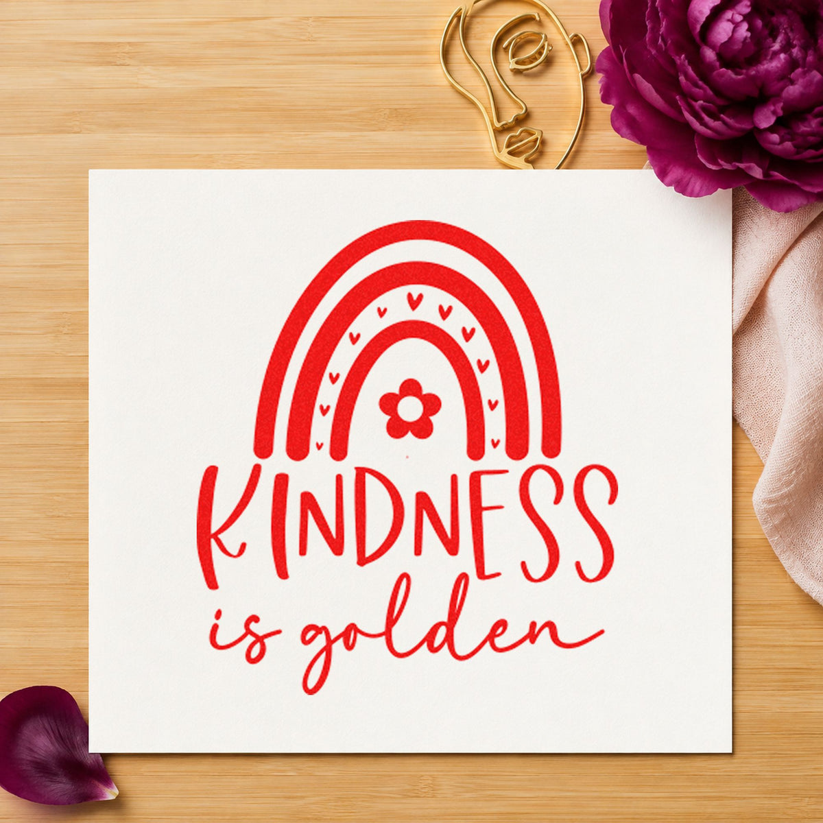 Kindness Is Golden Rainbow craft stamp imprint in red ink on a handmade project, one idea being brave sit cards.