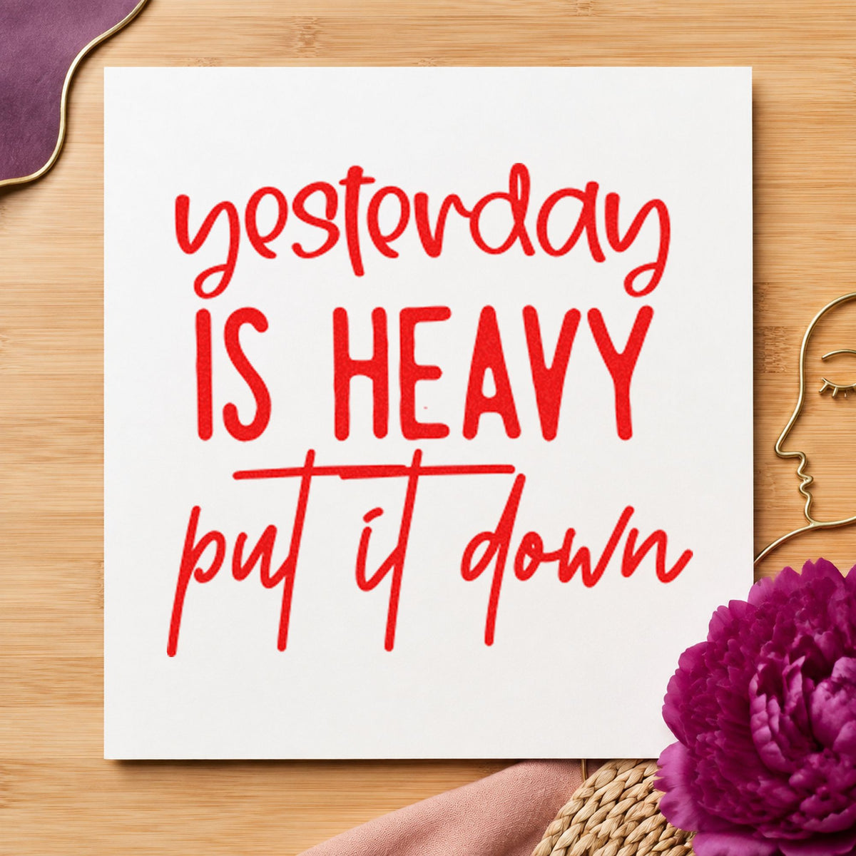 Yesterday Is Heavy Quote craft stamp imprint in red ink on a handmade project, one idea being reset note cards.
