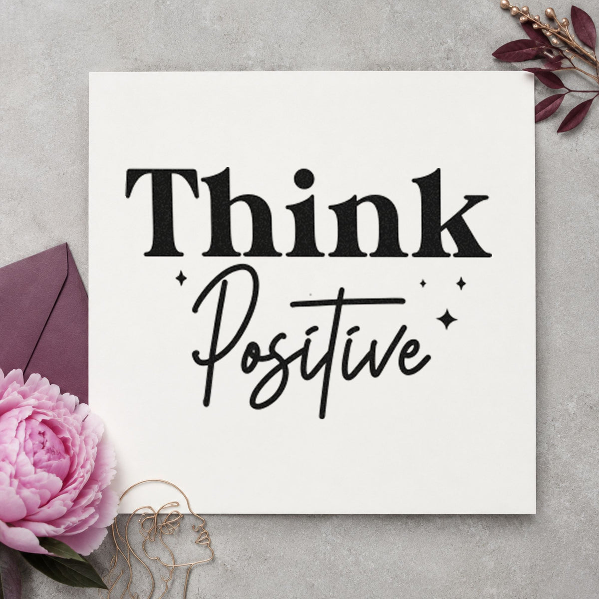 Think Positive Sparkle Lettering craft stamp imprint in black ink on a handmade project, one idea being take home gift tags.