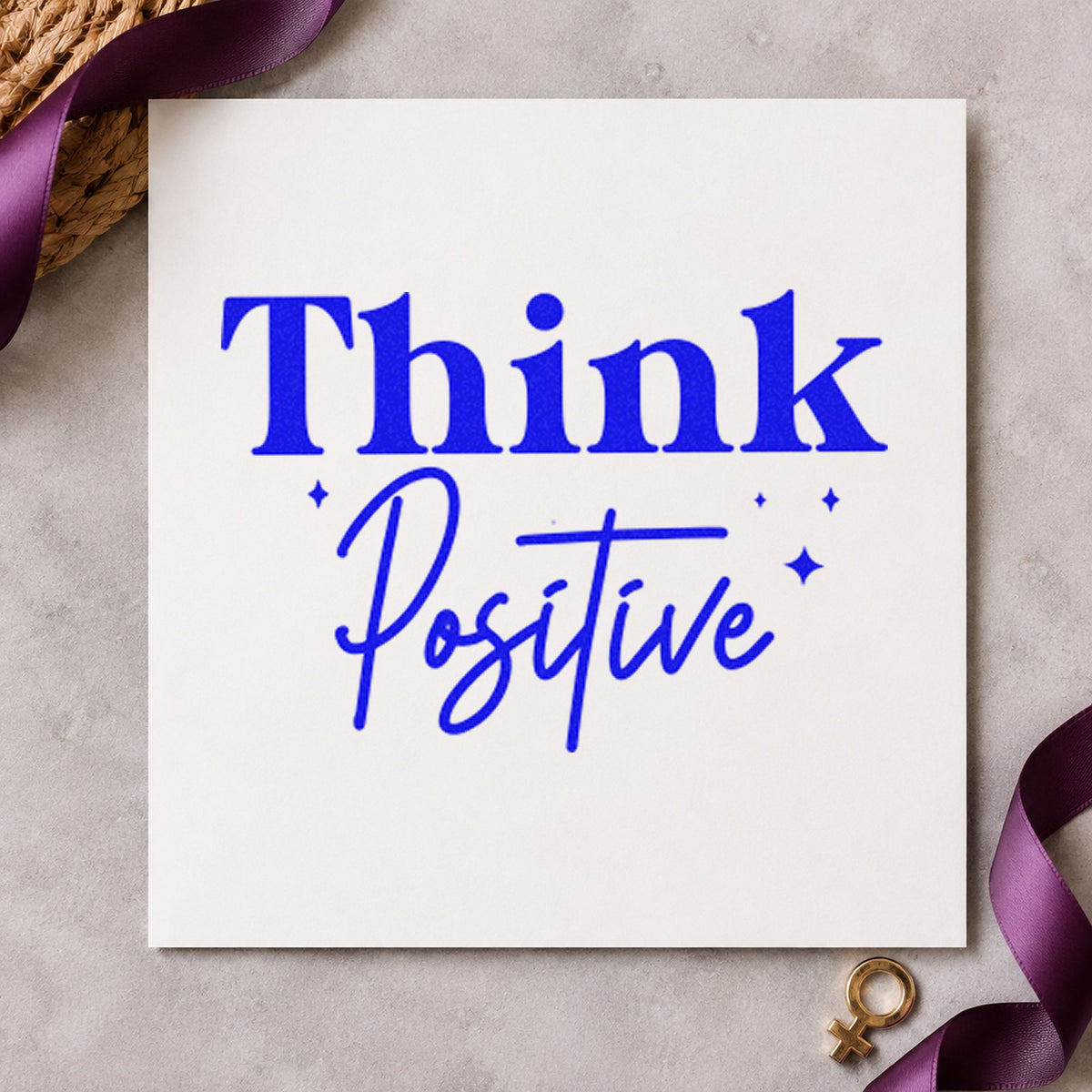 Think Positive Sparkle Lettering craft stamp in blue ink on cardstock, an easy option for staff scrub printing.