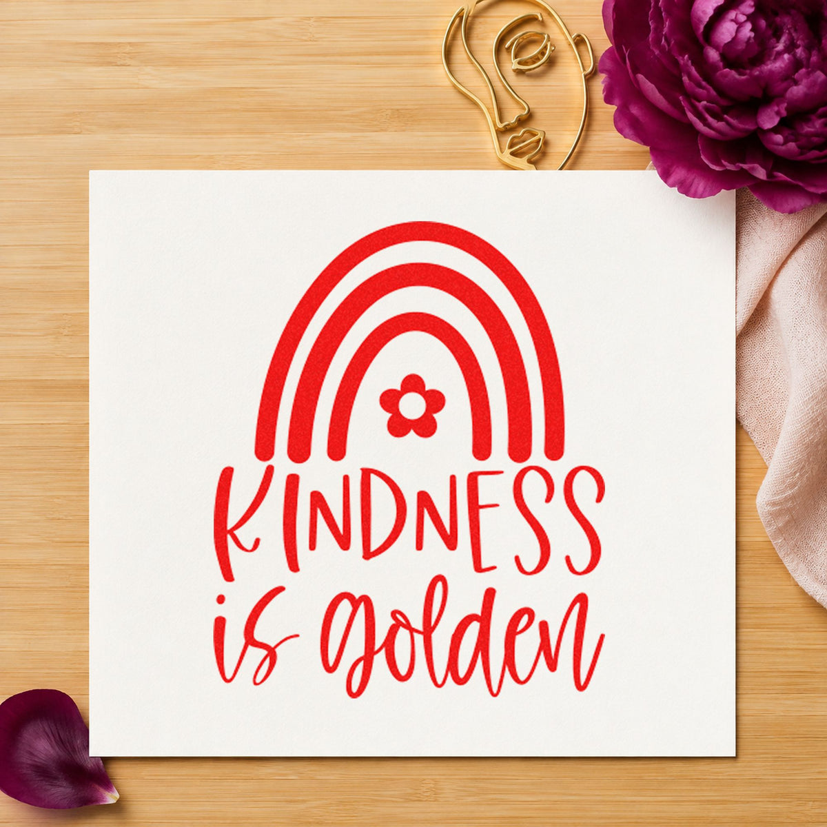 Kindness Golden Flower Rainbow craft stamp imprint in red ink on a handmade project, one idea being buddy invite cards.
