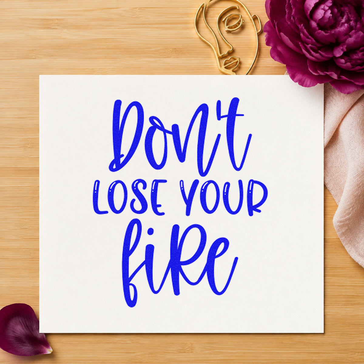 Do Not Lose Fire craft stamp imprinted in blue ink on paper, a design suited to framed trailer side.