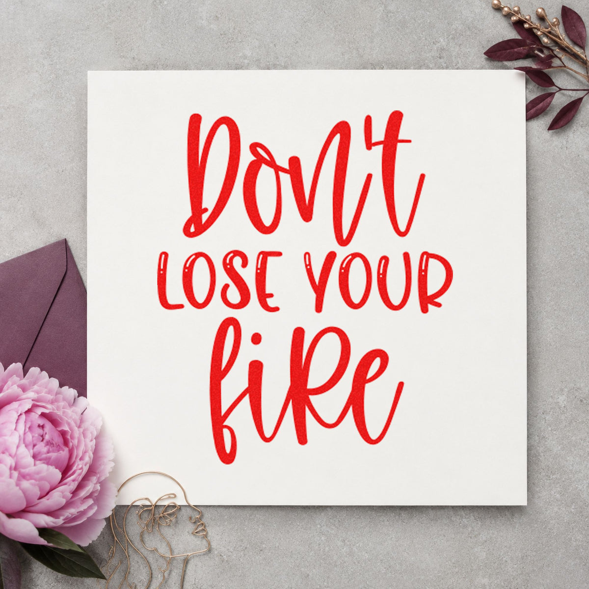 Do Not Lose Fire craft stamp imprint in red ink on a handmade project, one idea being judge sheet cards.