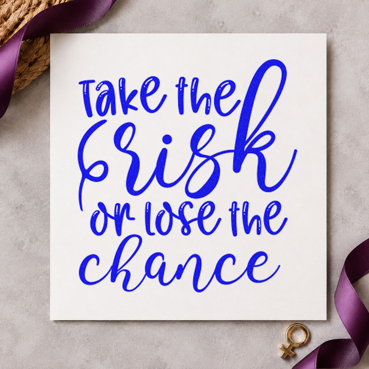 Take Risk Lose Chance craft stamp in blue ink on cardstock, an easy option for long cloth printing.