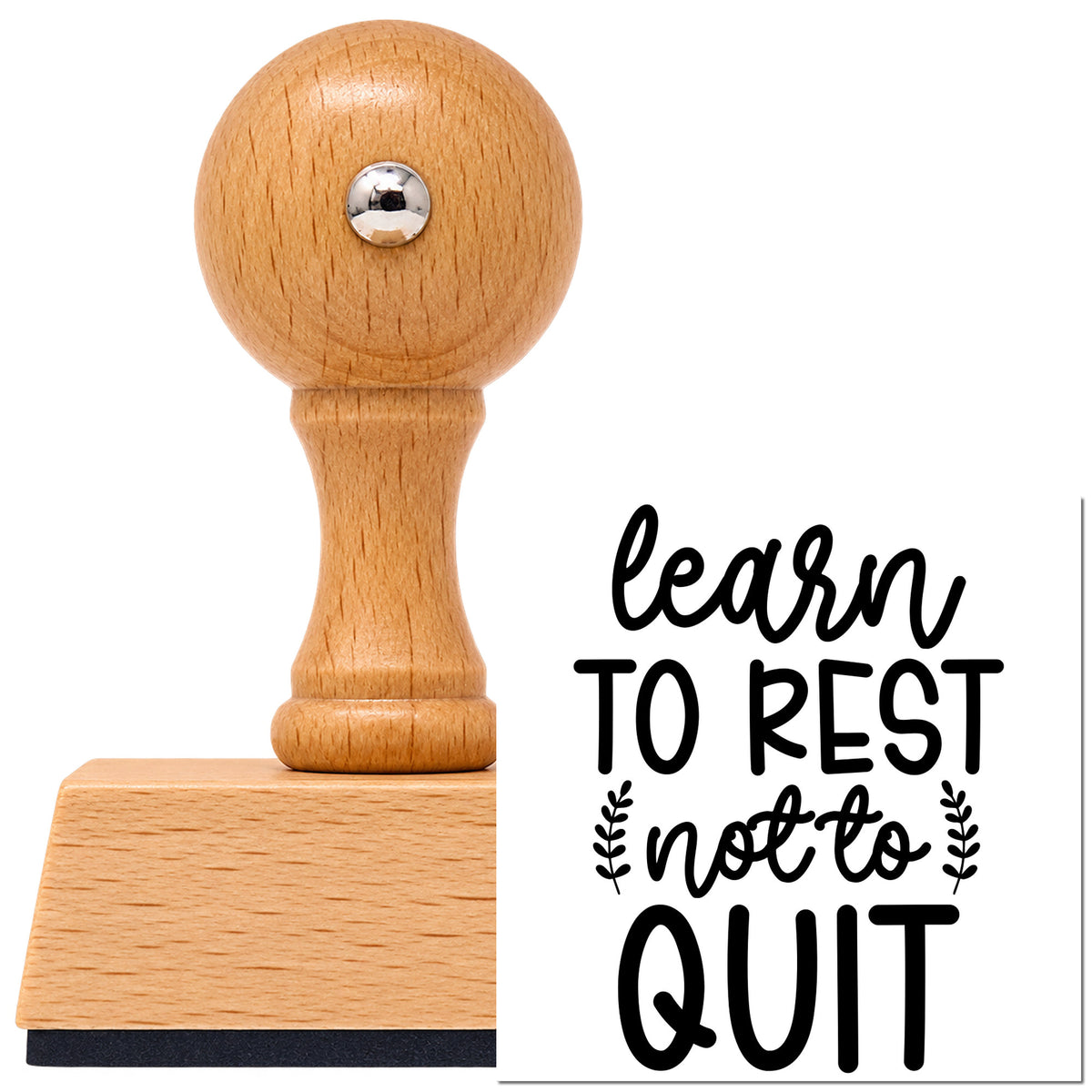 Learn Rest Not Quit Vintage Pro rubber stamp in European beech wood with a round knob handle, shown beside its black imprint.