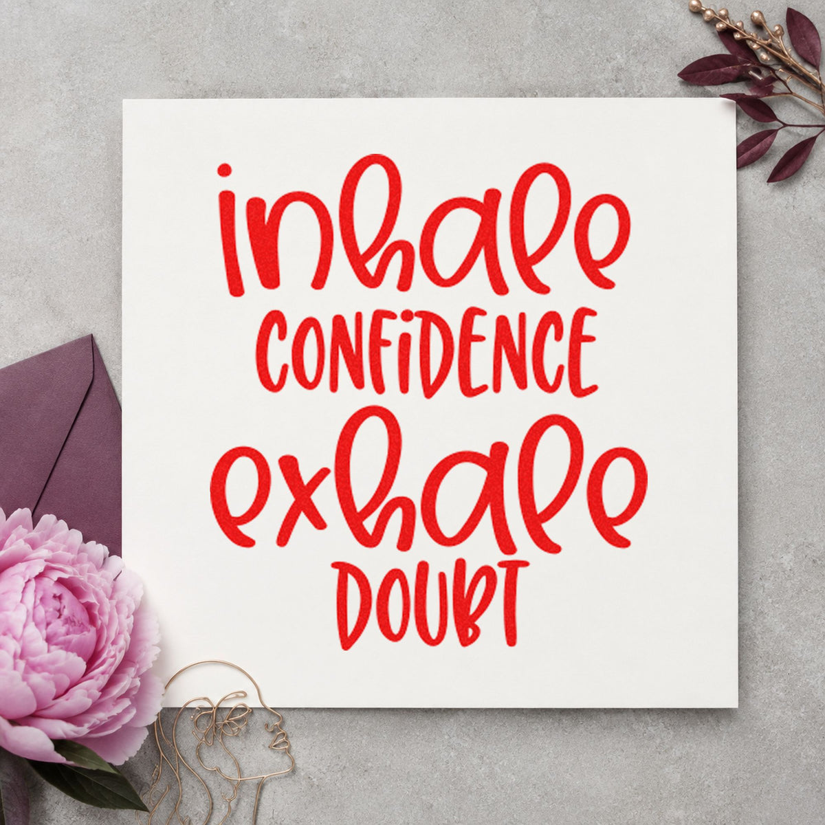 Inhale Confidence Exhale Doubt rubber stamp shown in red ink, stamped for projects such as bin board labels.