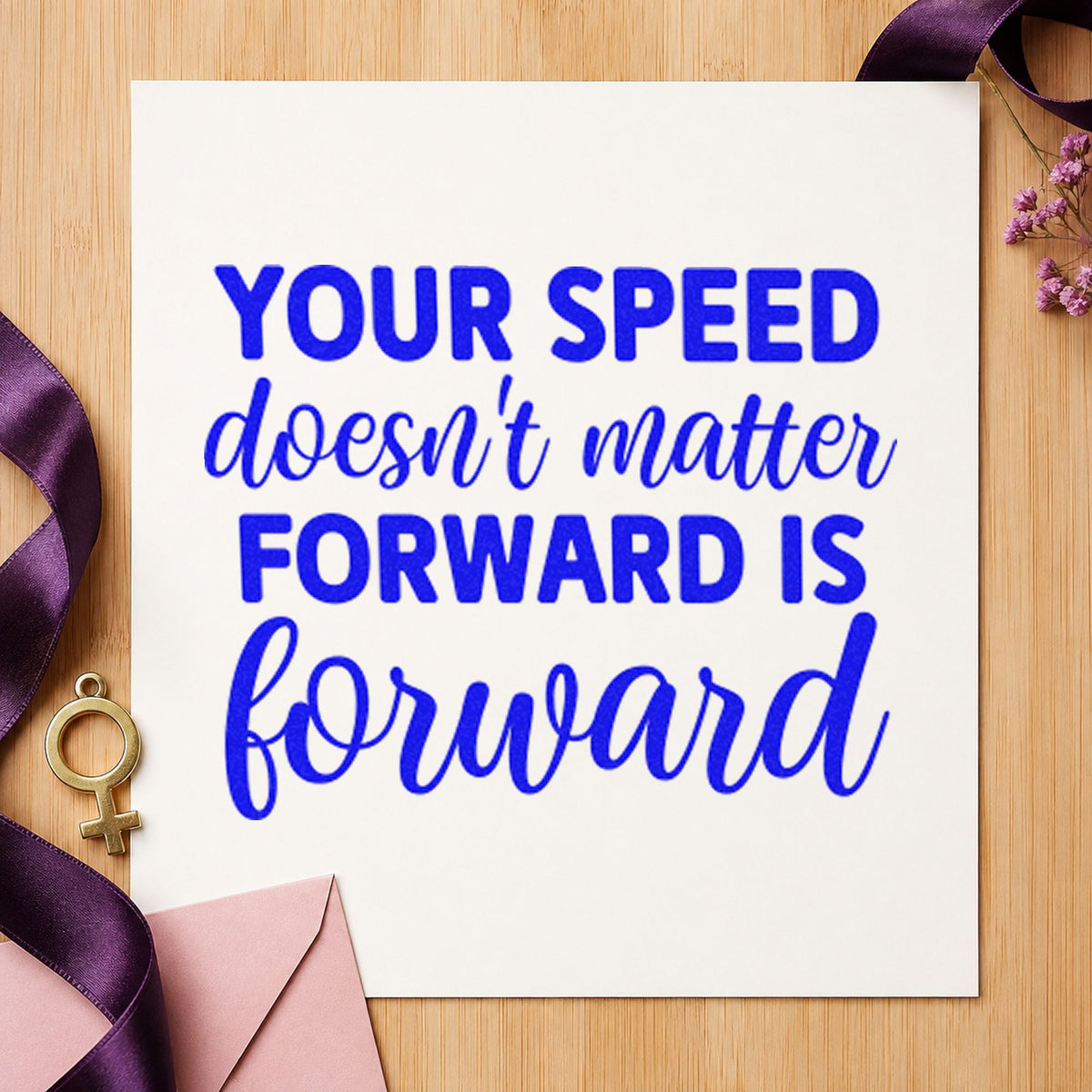 Your Speed Forward Quote craft stamp imprinted in blue ink on paper, a design suited to framed garage rack.