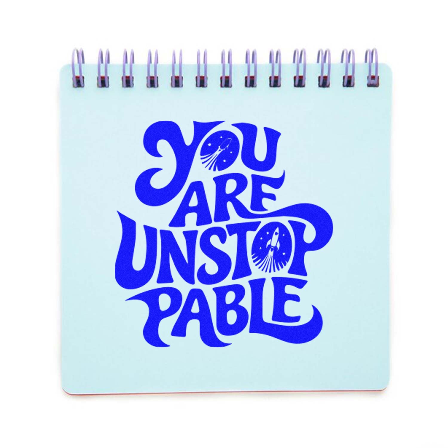 You Are Unstoppable rubber stamp design with bold blue retro lettering on a spiral notebook cover.