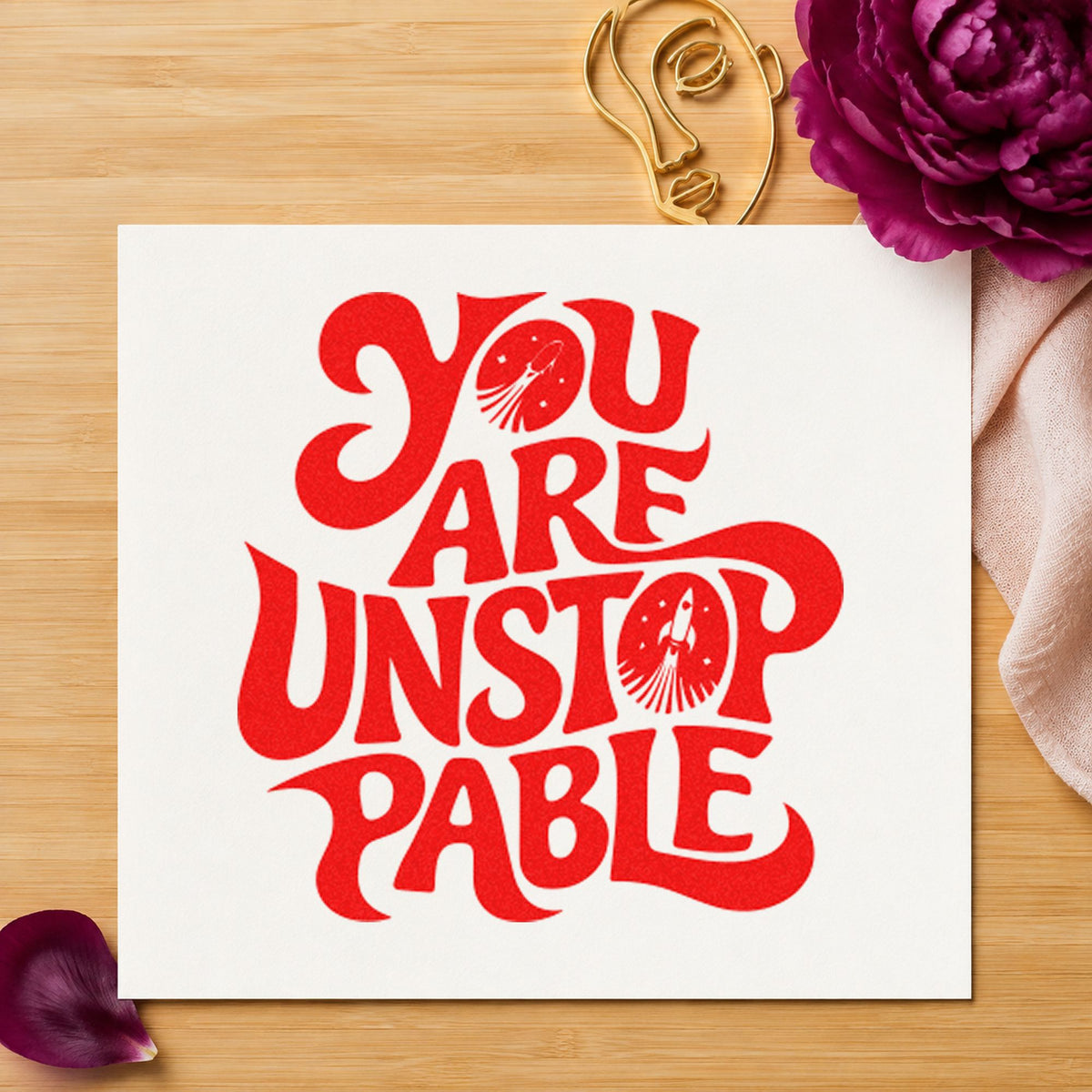 You Are Unstoppable Lettering rubber stamp shown in red ink, stamped for projects such as stall player labels.