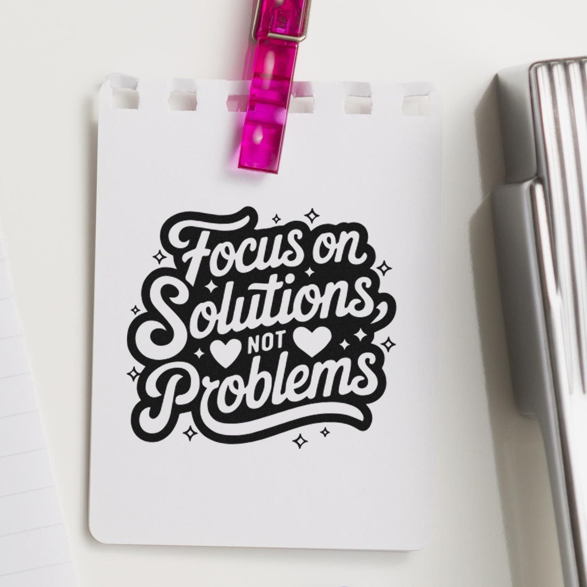 Premium Wooden Focus On Solutions Not Problems Stamp - Vintage Pro imprint stamped in black ink. Focus on Solutions NOT Problems appears with hearts and sparkles on a dark outlined shape.