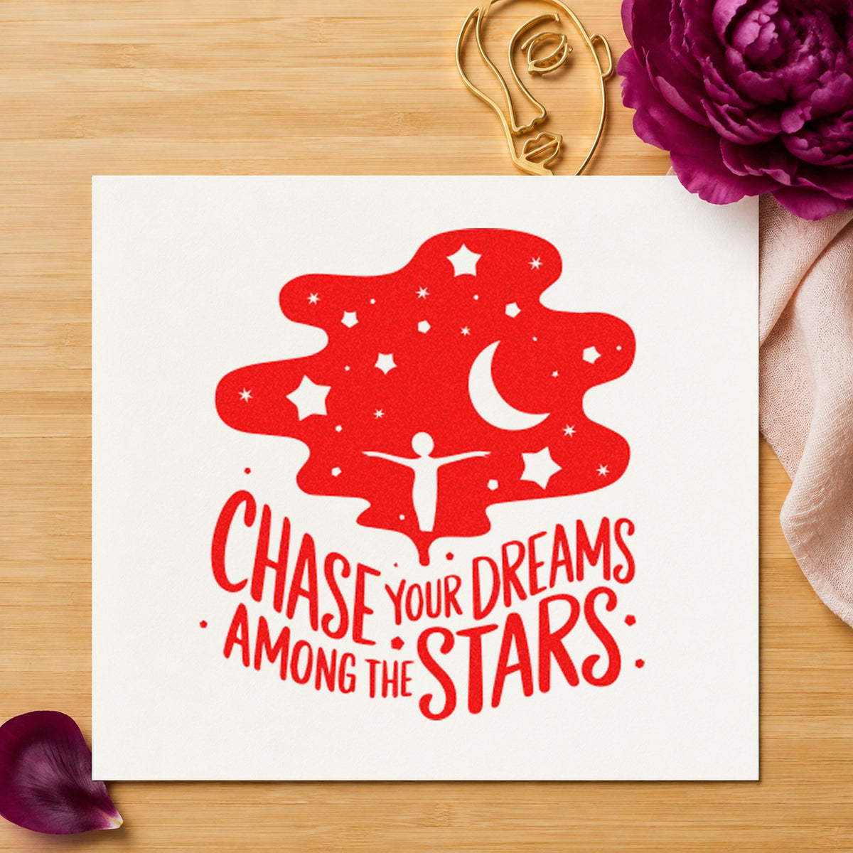 Chase Dreams Among Stars craft stamp imprint in red ink on a handmade project, one idea being target plan cards.