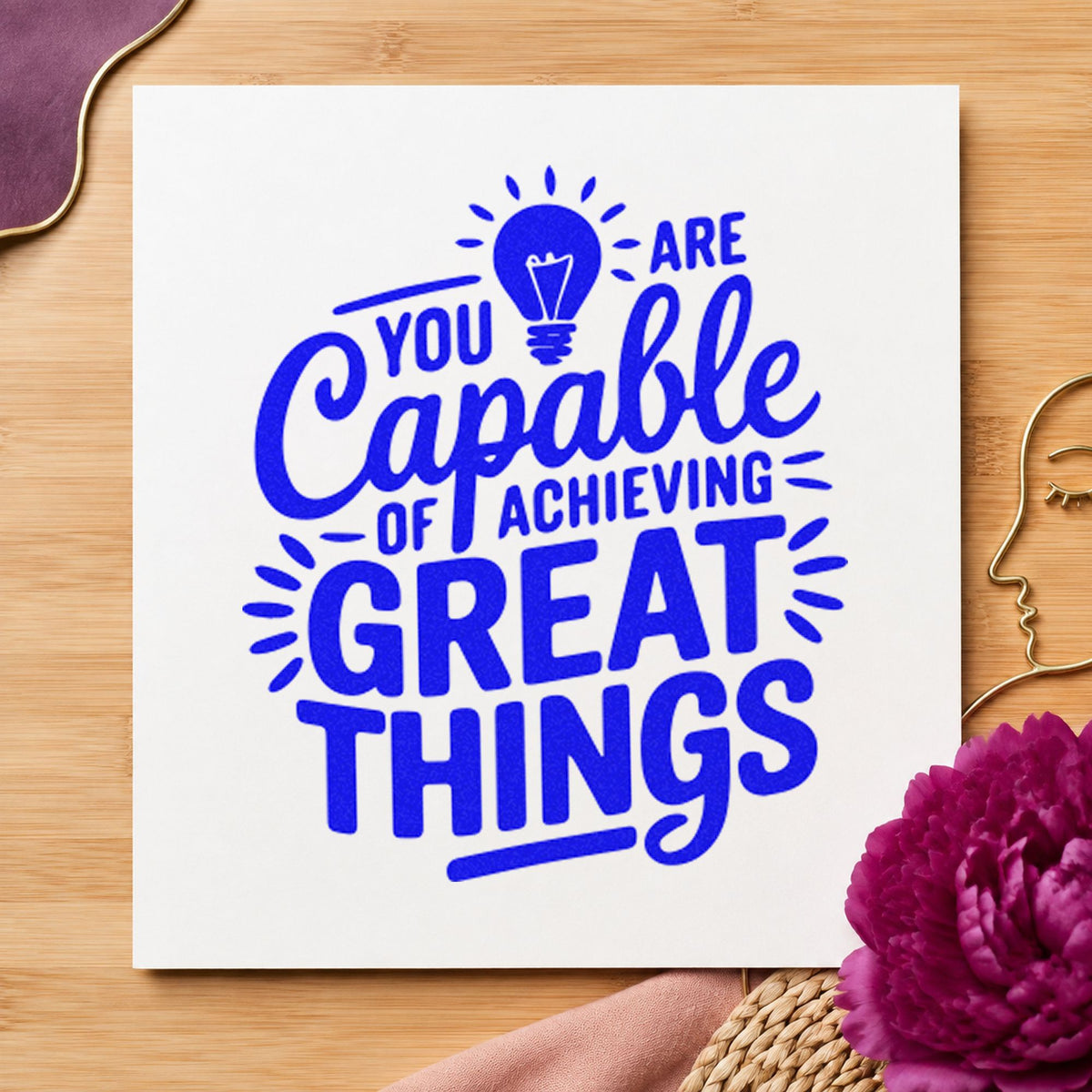 Capable Of Great Things craft stamp in blue ink on cardstock, an easy option for bench mat printing.