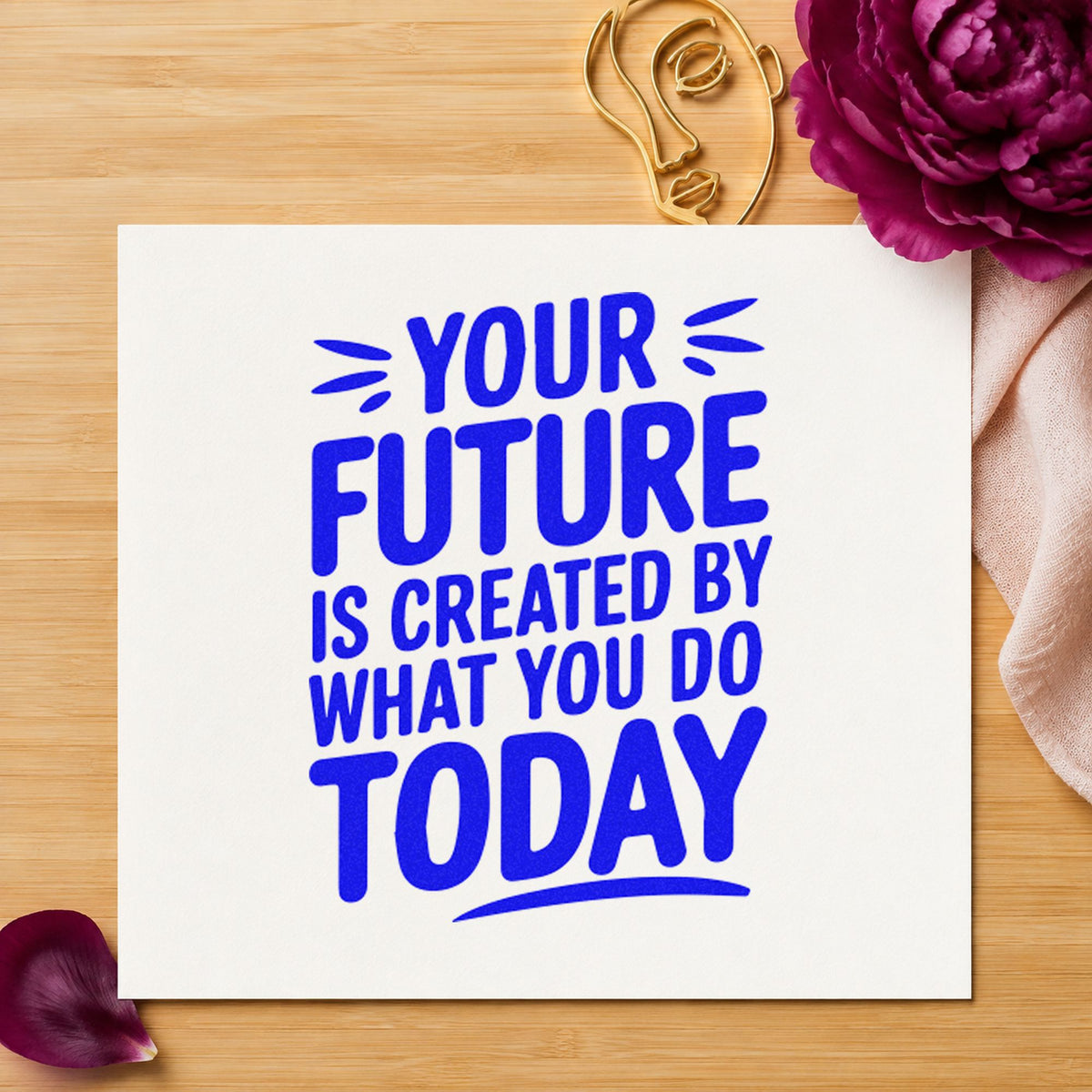 Your Future Created Today craft stamp imprinted in blue ink on paper, a design suited to framed study nook.