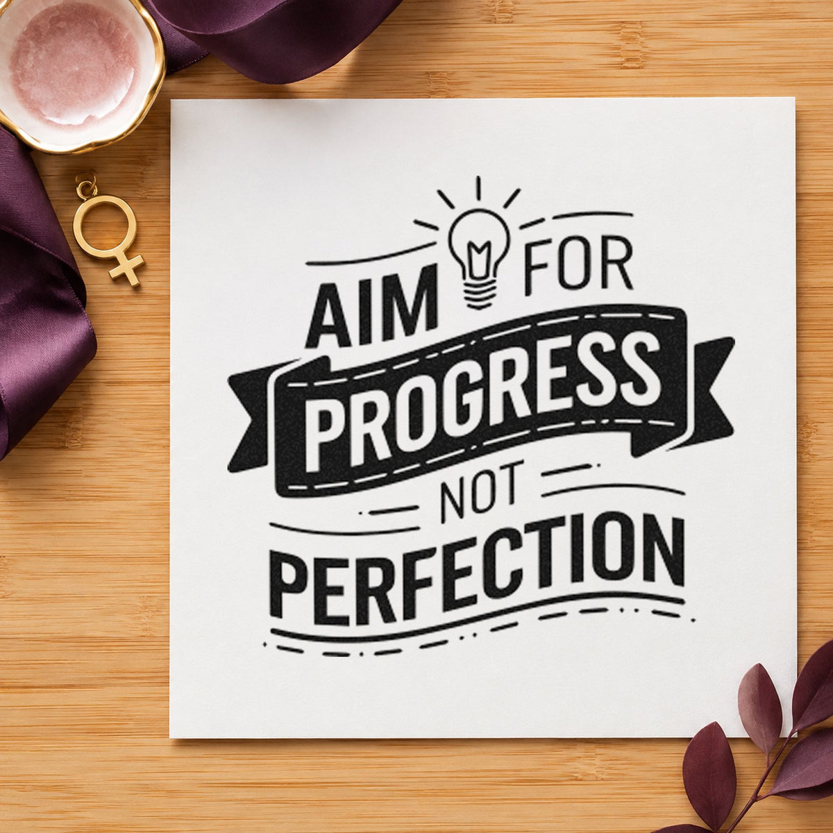 Aim Progress Not Perfection craft stamp in black ink on cardstock, an easy option for handwriting album page.