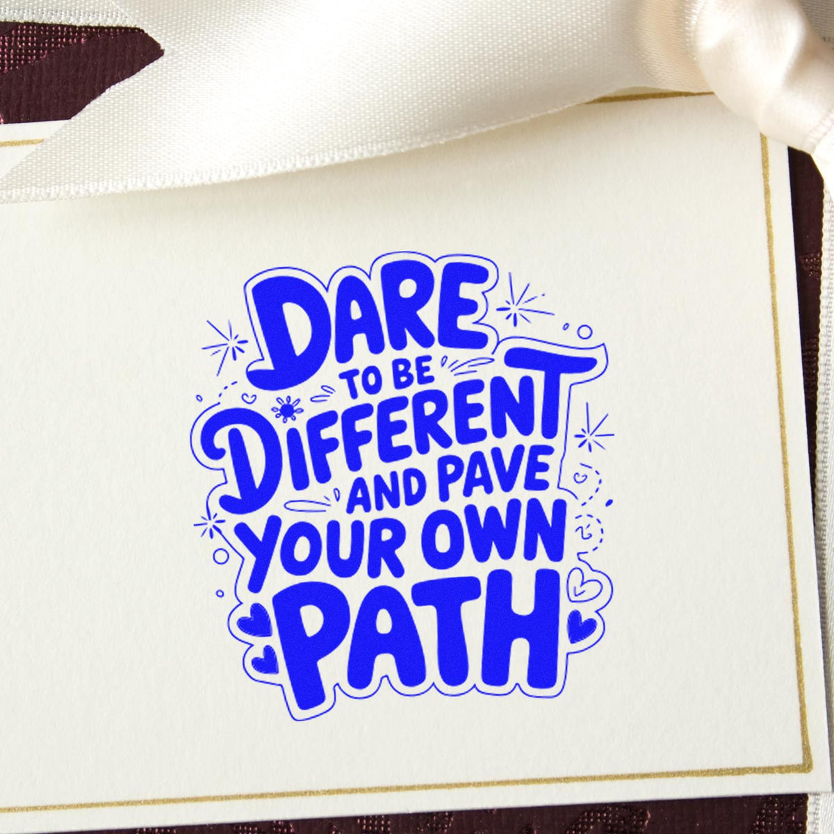Dare Different Own Path rubber stamp shown in blue ink, stamped for projects such as costume album page.